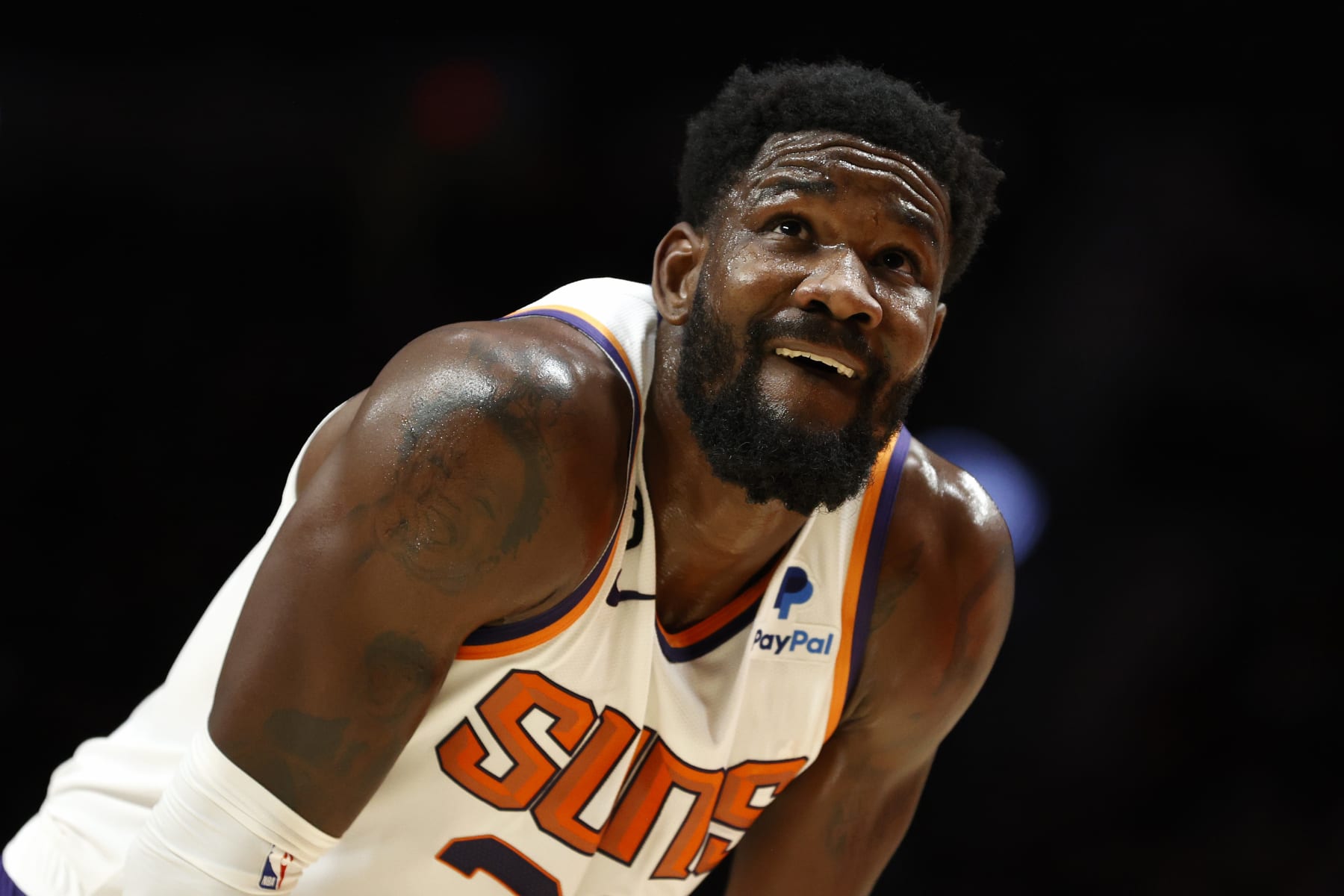 PORTLAND, OREGON - OCTOBER 21: Deandre Ayton #22 of the Phoenix Suns looks on during the first quarter against the Portland Trail Blazers at Moda Center on October 21, 2022 in Portland, Oregon. NOTE TO USER: User expressly acknowledges and agrees that, by downloading and or using this photograph, User is consenting to the terms and conditions of the Getty Images License Agreement. (Photo by Steph Chambers/Getty Images)