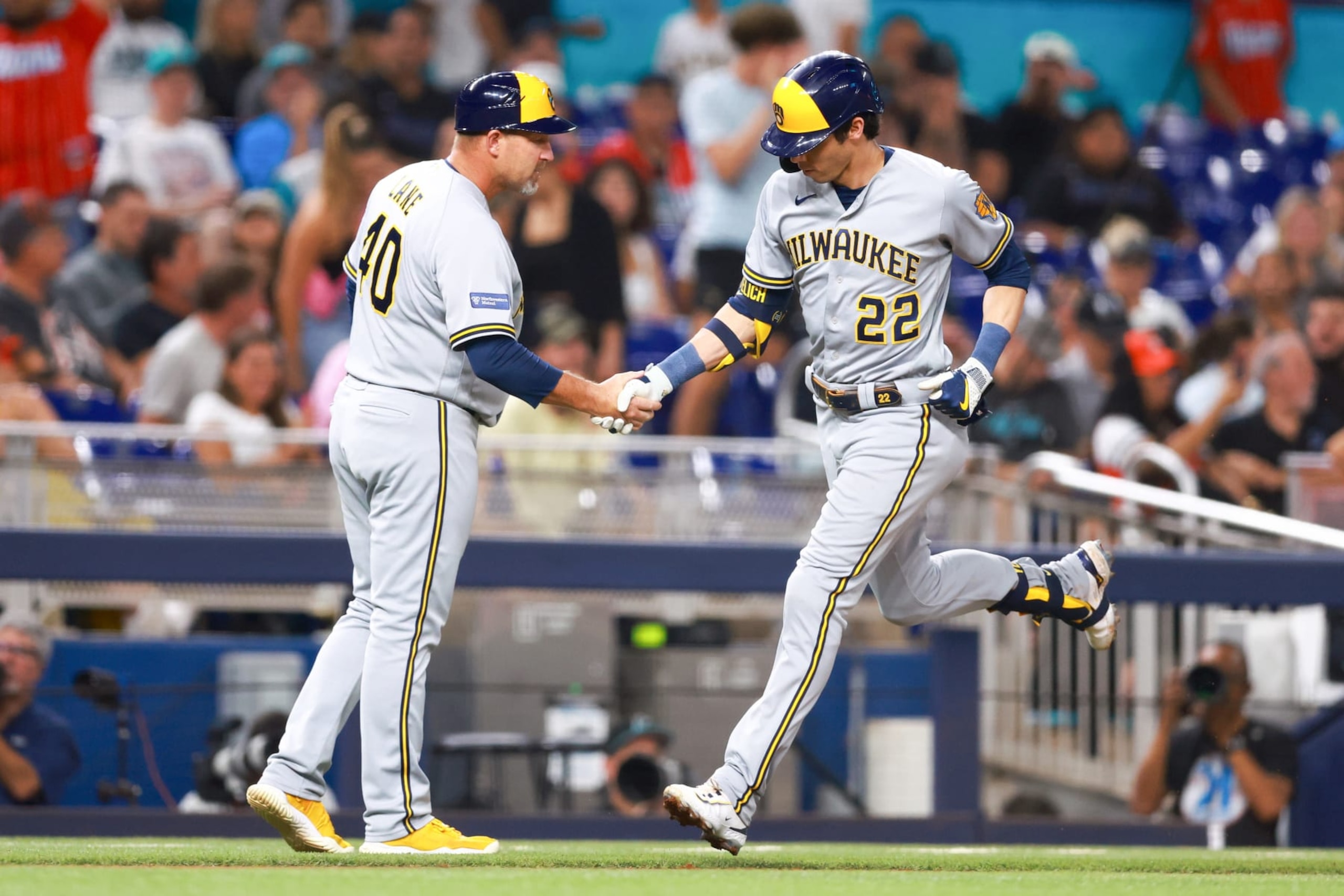 MIAMI, FLORIDA - SEPTEMBER 22: Christian Yelich #22 of the Milwaukee Brewers rounds the bases after hitting a home run against the Miami Marlins during the second inning of the game at loanDepot park on September 22, 2023 in Miami, Florida. (Photo by Megan Briggs/Getty Images)