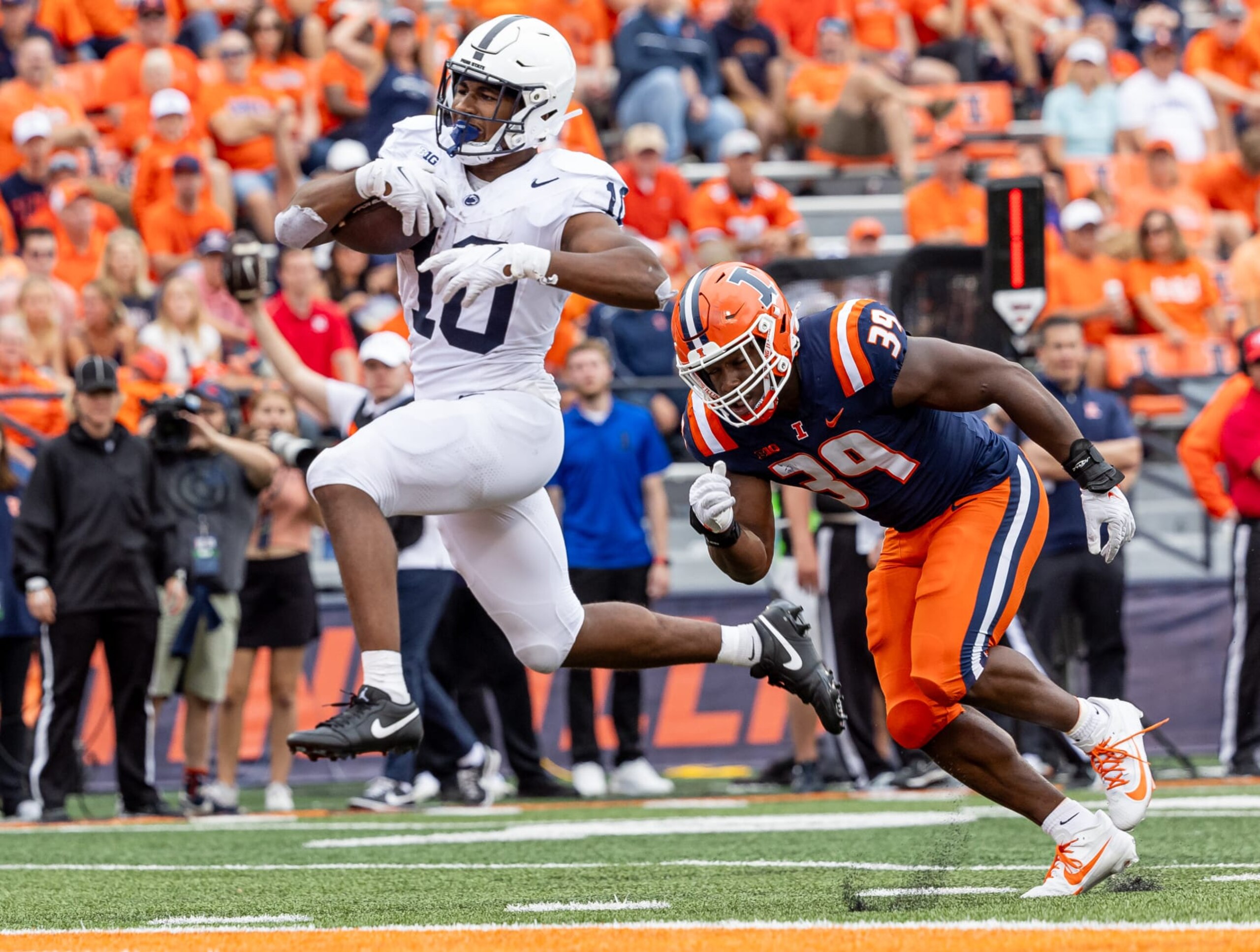 CHAMPAIGN, ILLINOIS - SEPTEMBER 16: Nicholas Singleton #10 of the Penn State Nittany Lions runs for a touchdown during the game against the Illinois Fighting Illini at Memorial Stadium on September 16, 2023 in Champaign, Illinois. (Photo by Michael Hickey/Getty Images)