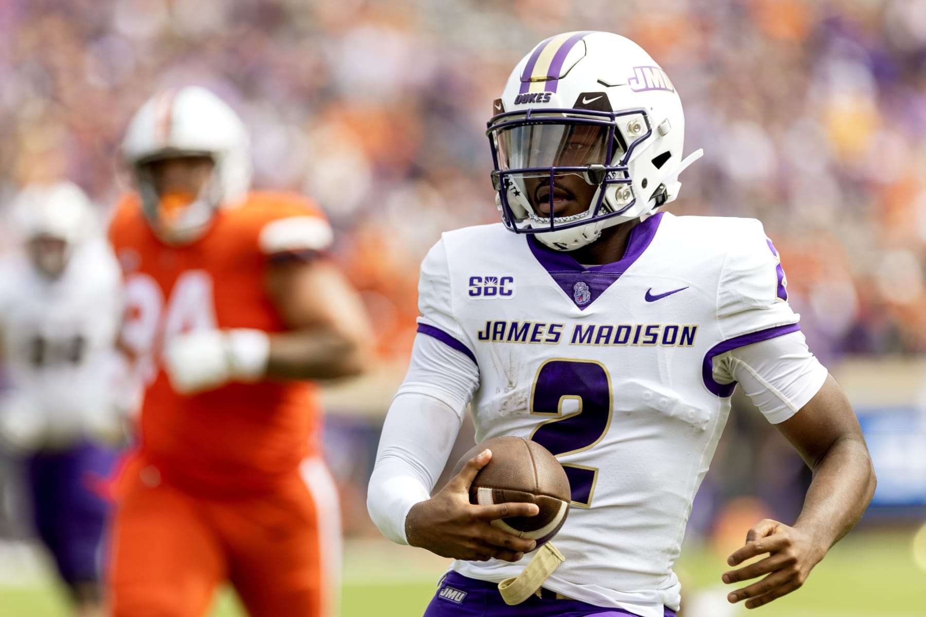 CHARLOTTESVILLE, VIRGINIA - SEPTEMBER 9: Jordan McCloud #2 of the James Madison Dukes rushes in the first half during a game against the Virginia Cavaliers at Scott Stadium on September 9, 2023 in Charlottesville, Virginia. (Photo by Ryan M. Kelly/Getty Images)