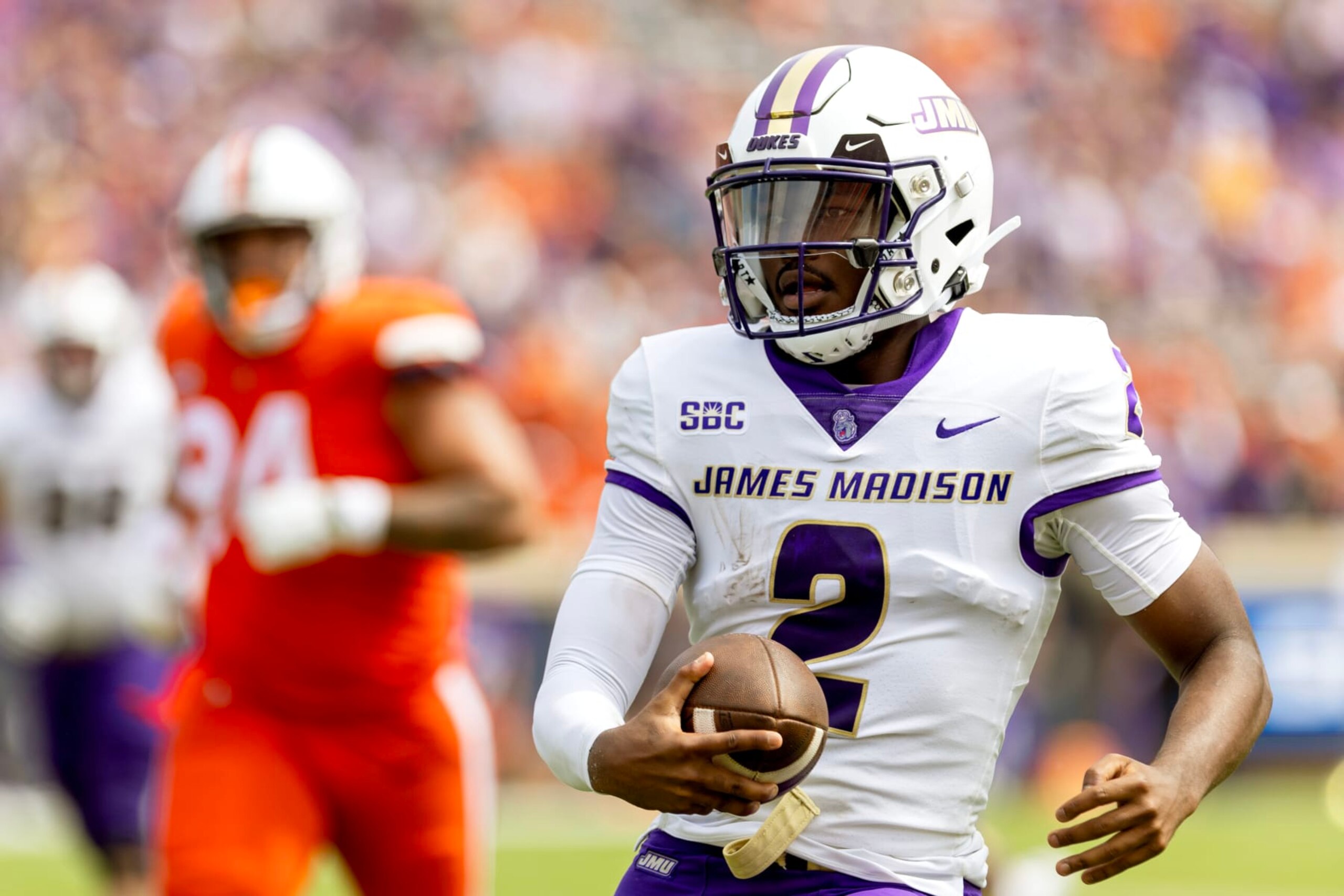 CHARLOTTESVILLE, VIRGINIA - SEPTEMBER 9: Jordan McCloud #2 of the James Madison Dukes rushes in the first half during a game against the Virginia Cavaliers at Scott Stadium on September 9, 2023 in Charlottesville, Virginia. (Photo by Ryan M. Kelly/Getty Images)