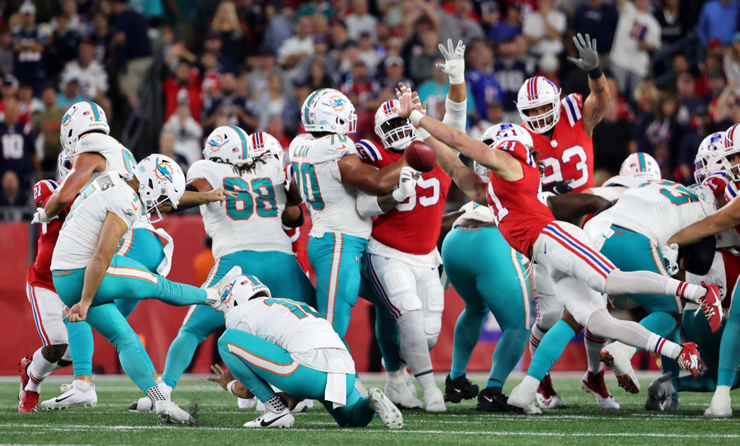 Foxborough, MA - September 17: New England Patriots S Brenden Schooler blocks a field goal attempt by Miami Dolphins K Jason Sanders in the second half. The Patriots lost to the Dolphins, 24-17. (Photo by Matthew J. Lee/The Boston Globe via Getty Images)