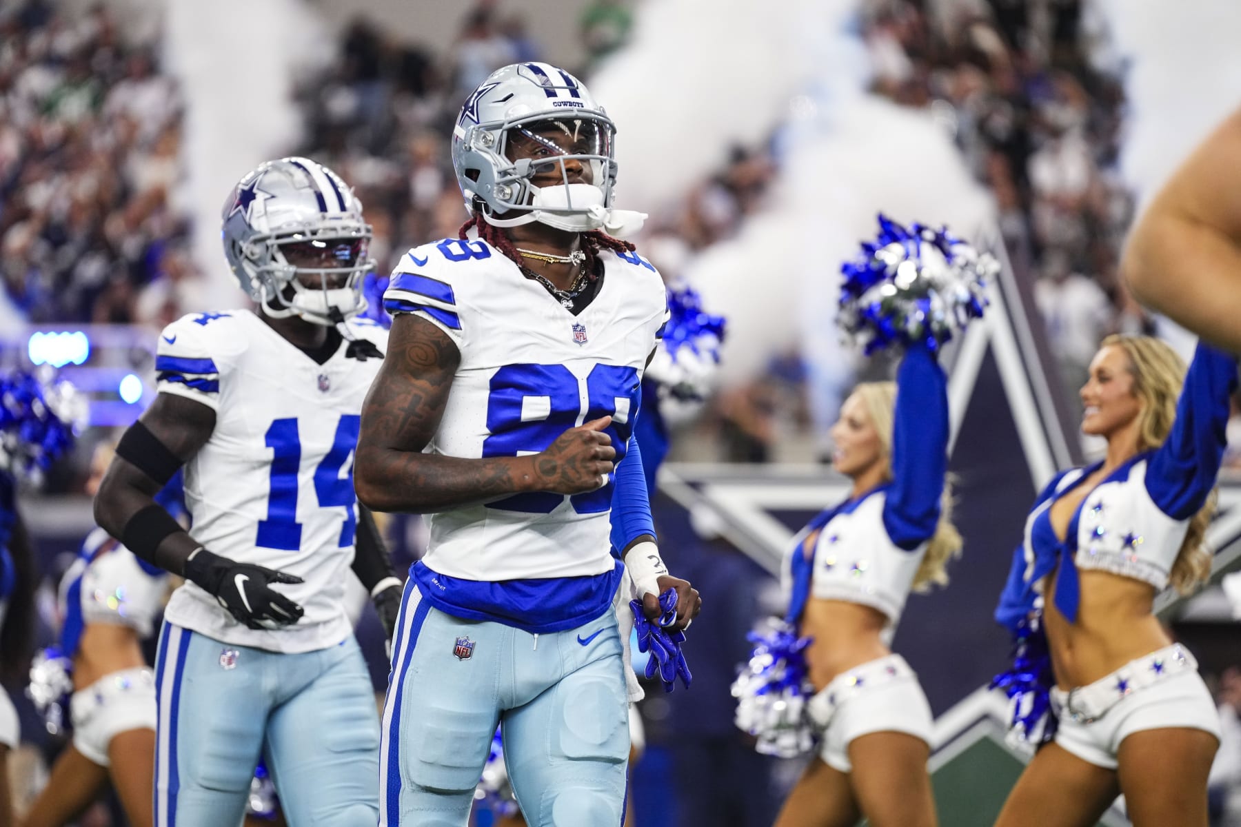 ARLINGTON, TX - SEPTEMBER 17: CeeDee Lamb #88 of the Dallas Cowboys runs out onto the field prior to a football game at AT&T Stadium on September 17, 2023 in Arlington, Texas. (Photo by Cooper Neill/Getty Images)