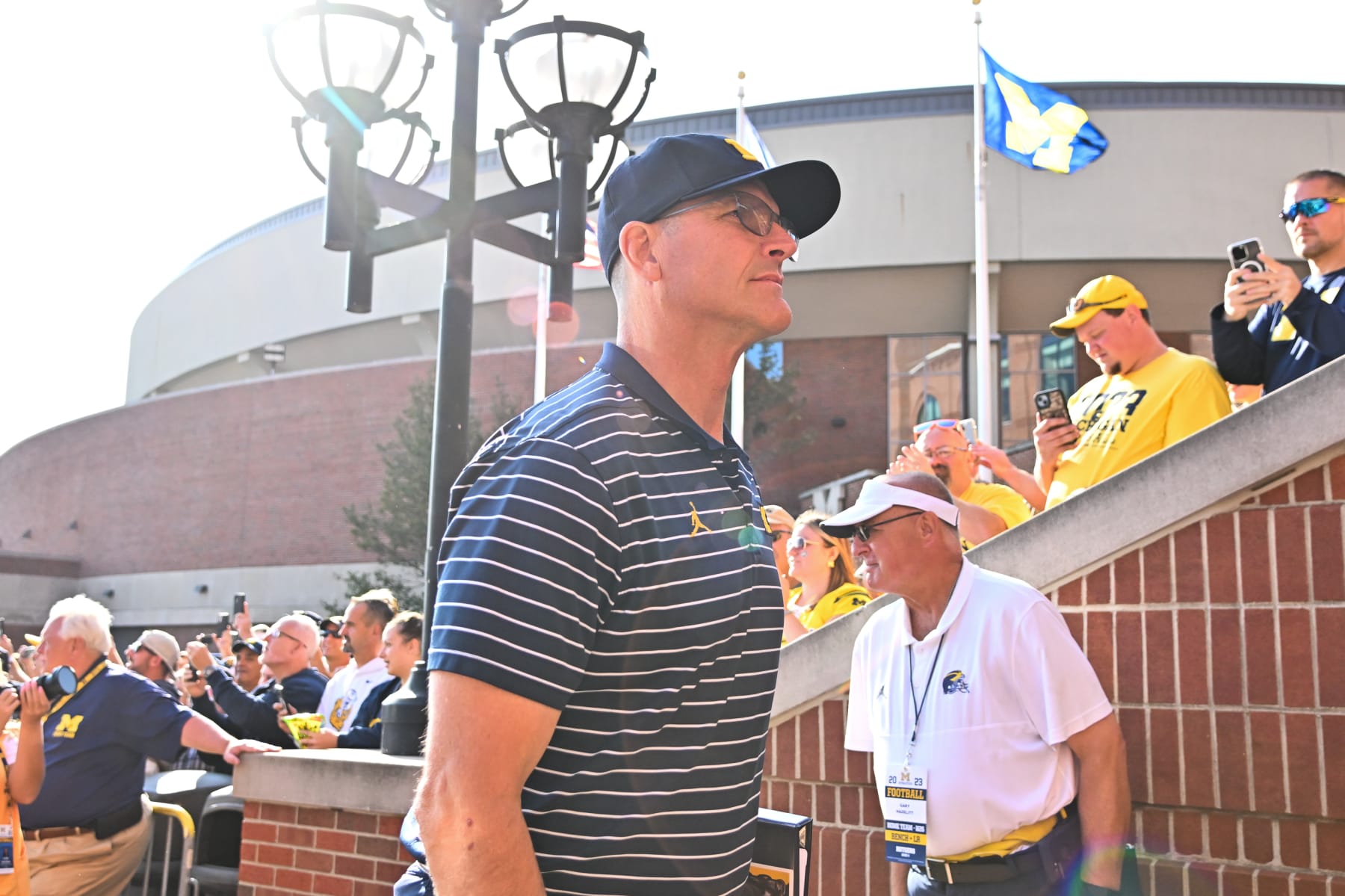 ANN ARBOR, MI - SEPTEMBER 23: Michigan Wolverines head coach Jim Harbaugh walks in prior to the game between the University of Michigan Wolverines versus the Rutgers Scarlet Knights on Saturday September 23, 2023 at Michigan Stadium, Ann Arbor, MI. (Photo by Steven King/Icon Sportswire via Getty Images)