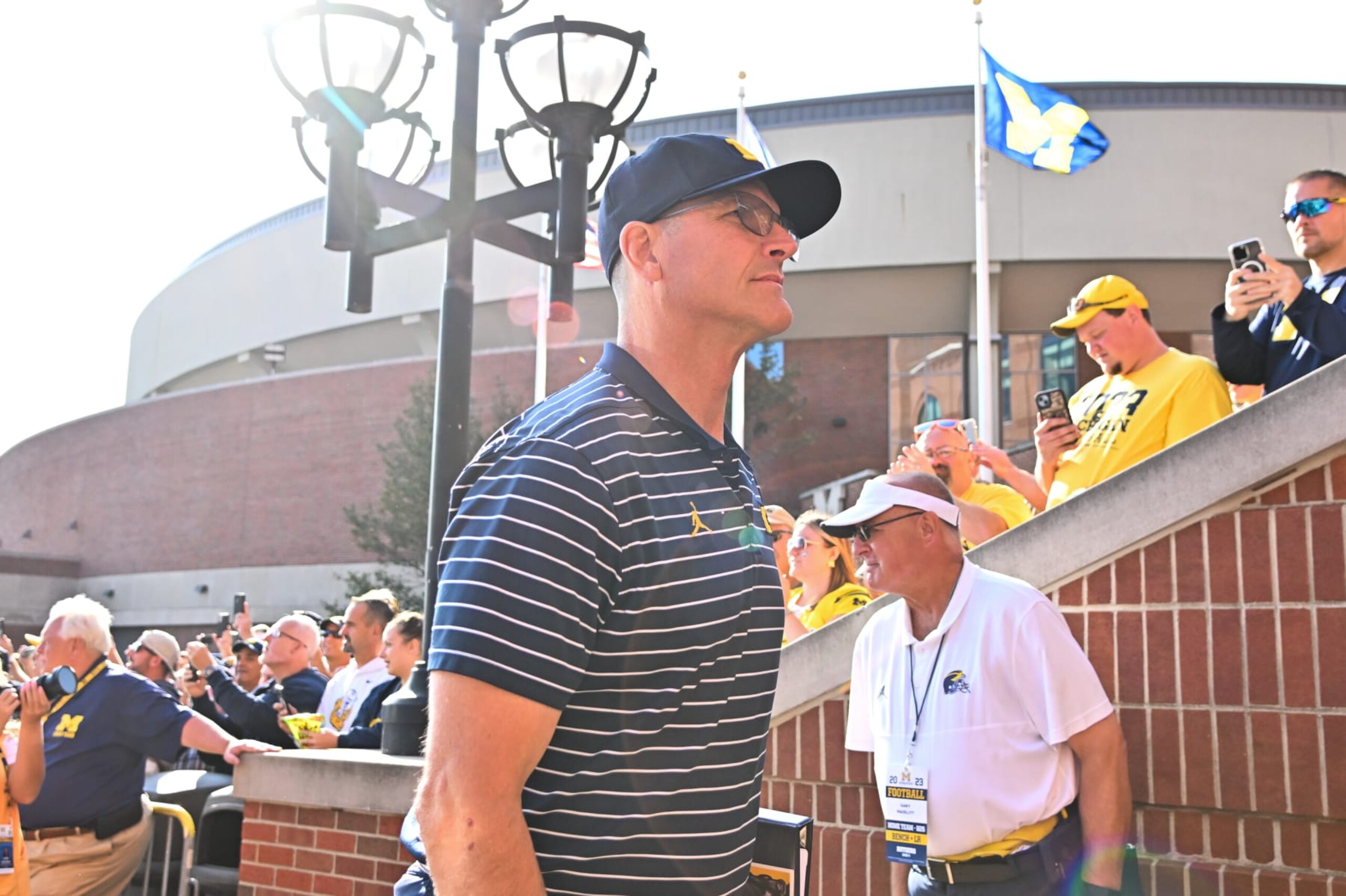 ANN ARBOR, MI - SEPTEMBER 23: Michigan Wolverines head coach Jim Harbaugh walks in prior to the game between the University of Michigan Wolverines versus the Rutgers Scarlet Knights on Saturday September 23, 2023 at Michigan Stadium, Ann Arbor, MI. (Photo by Steven King/Icon Sportswire via Getty Images)