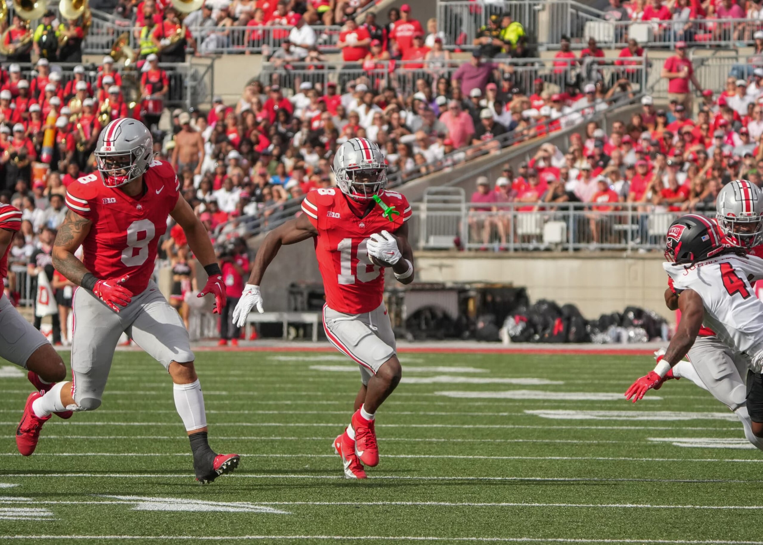 COLUMBUS, OH - SEPTEMBER 16: Wide receiver Marvin Harrison Jr. #18 of the Ohio State Buckeyes runs with the ball during the game against the Western Kentucky Hilltoppers at Ohio Stadium on September 16, 2023 in Columbus, Ohio. (Photo by Jason Mowry/Icon Sportswire via Getty Images)