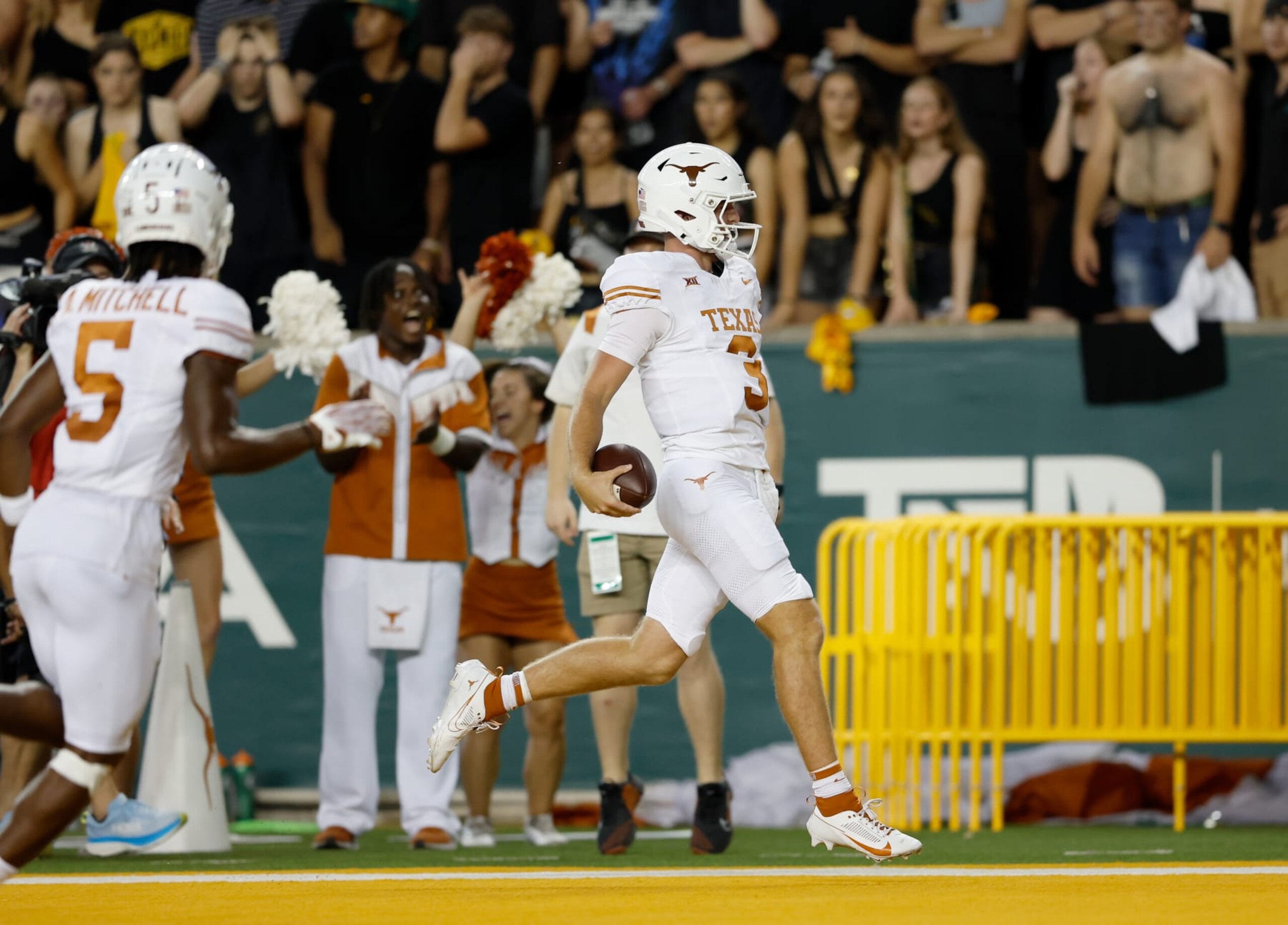 WACO, TEXAS - SEPTEMBER 23: Quinn Ewers #3 of the Texas Longhorns rushes for a touchdown in the first half against the Baylor Bears at McLane Stadium on September 23, 2023 in Waco, Texas. (Photo by Tim Warner/Getty Images)