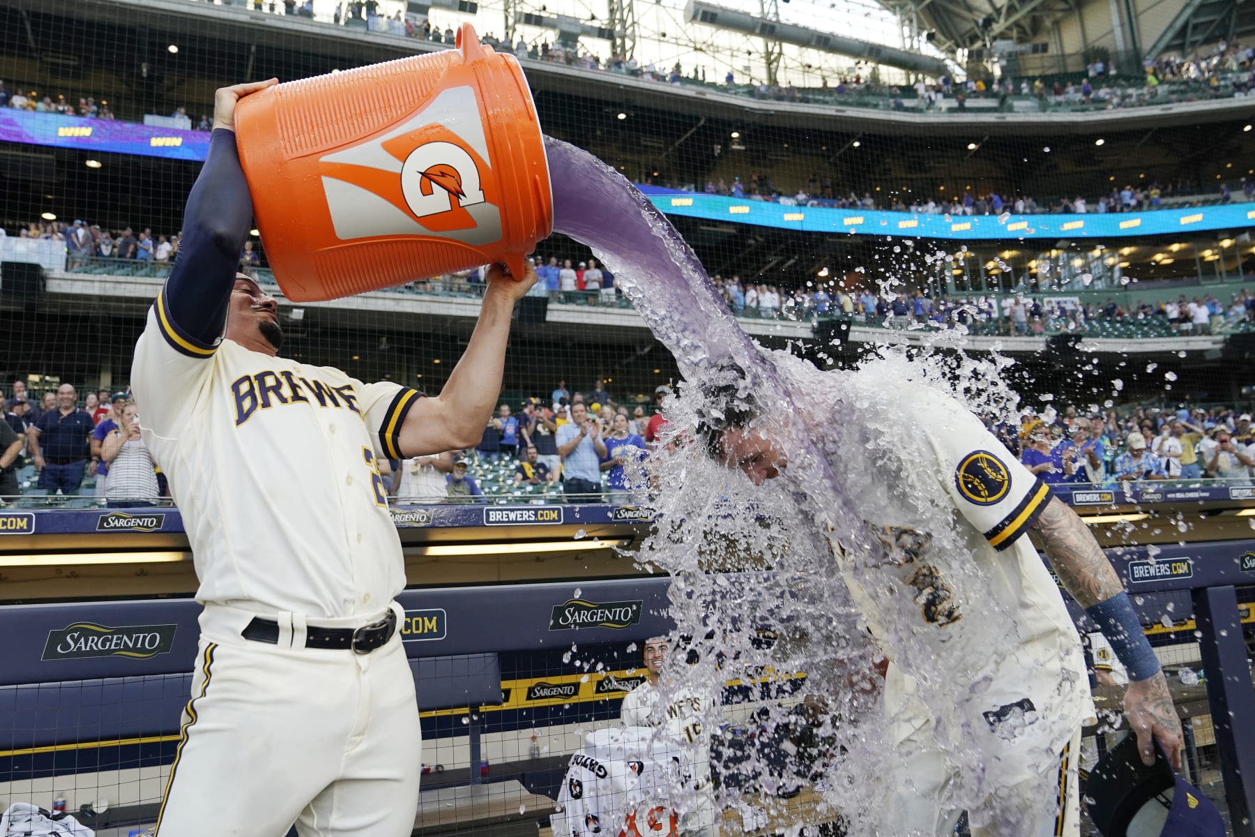 Milwaukee celebrates an extra-inning victory