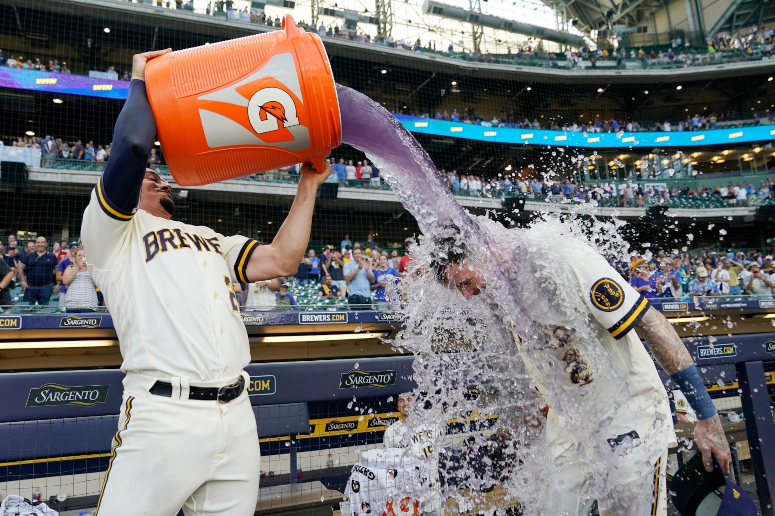 Milwaukee celebrates an extra-inning victory