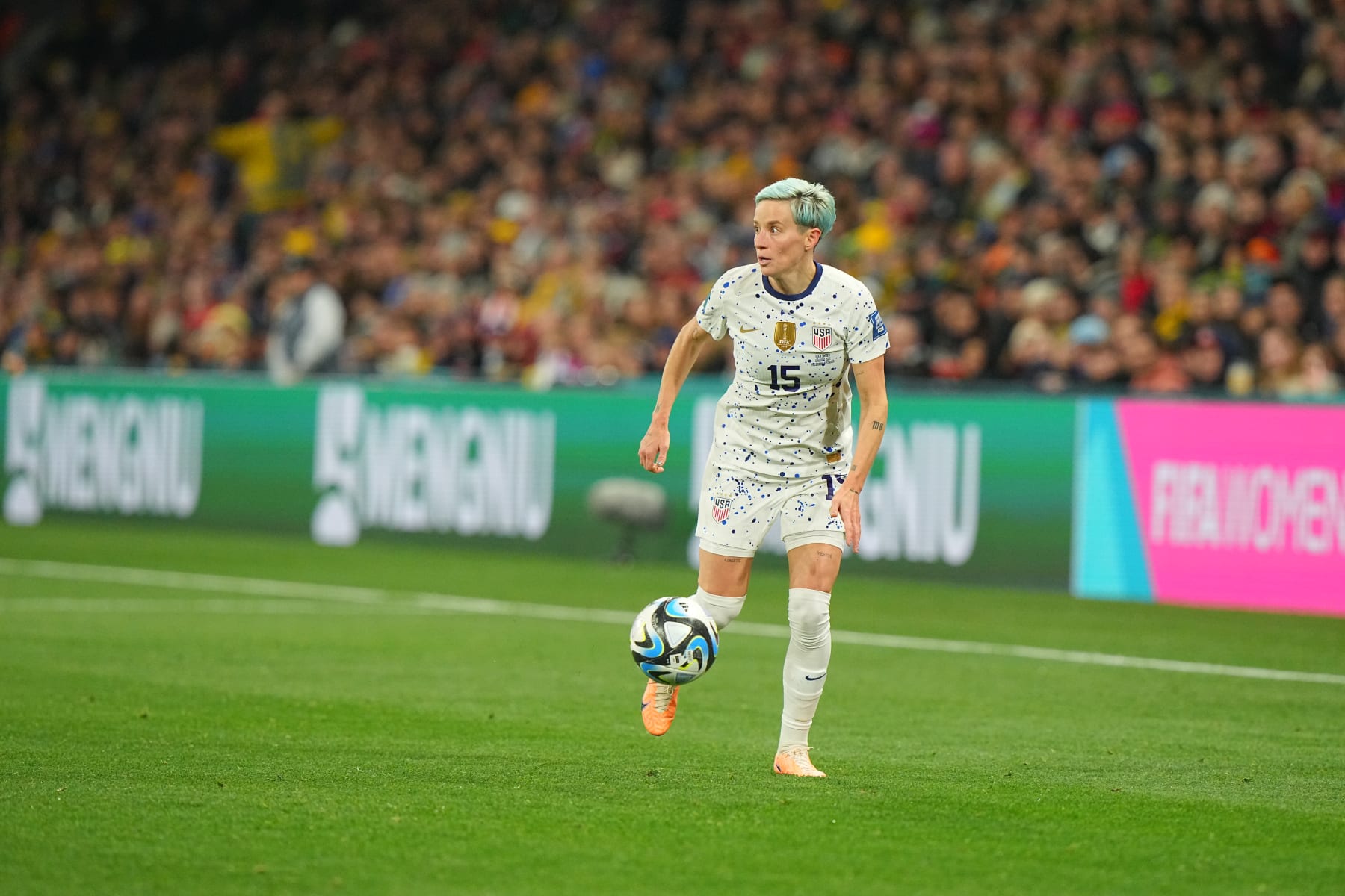 Soccer: FIFA World Cup: USA Megan Rapinoe (15) in action, dribbles the ball vs Sweden during a Round of 16 match between Winner Group G and Runner Up Group E at Melbourne Rectangular Stadium. 
Melbourne, Australia 8/6/2023 
CREDIT: Erick W. Rasco (Photo by Erick W. Rasco/Sports Illustrated via Getty Images) 
(Set Number: X164393 TK1)