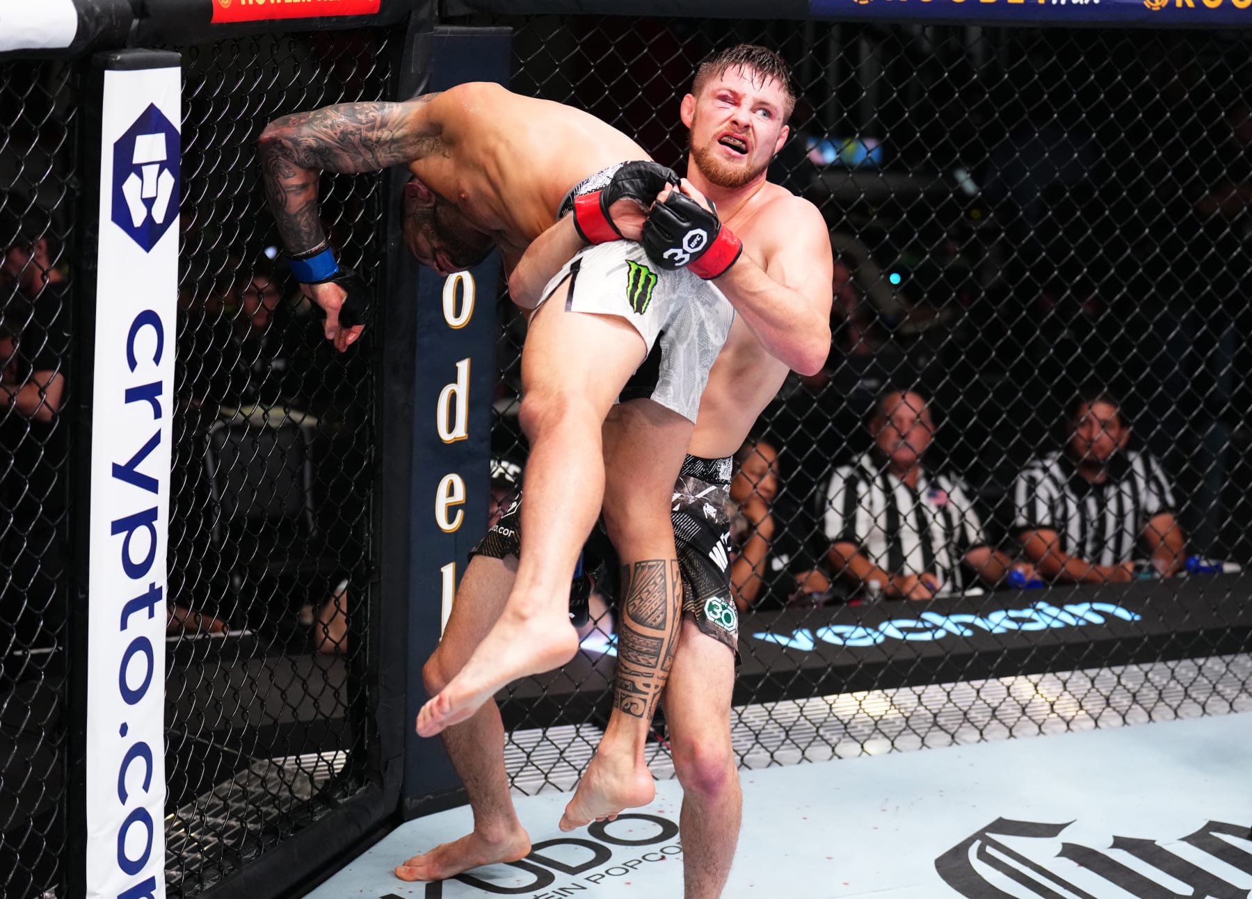 LAS VEGAS, NEVADA - SEPTEMBER 23: (R-L) Bryce Mitchell takes down Dan Ige in a featherweight fight during the UFC Fight Night event at UFC APEX on September 23, 2023 in Las Vegas, Nevada. (Photo by Chris Unger/Zuffa LLC via Getty Images)