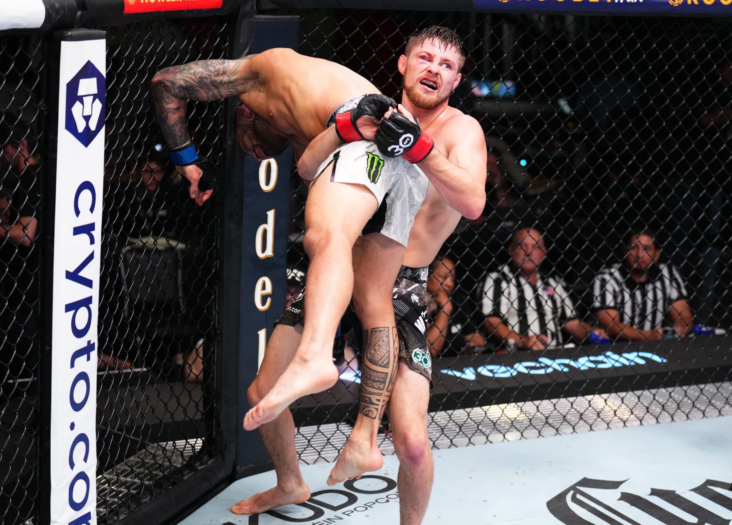 LAS VEGAS, NEVADA - SEPTEMBER 23: (R-L) Bryce Mitchell takes down Dan Ige in a featherweight fight during the UFC Fight Night event at UFC APEX on September 23, 2023 in Las Vegas, Nevada. (Photo by Chris Unger/Zuffa LLC via Getty Images)