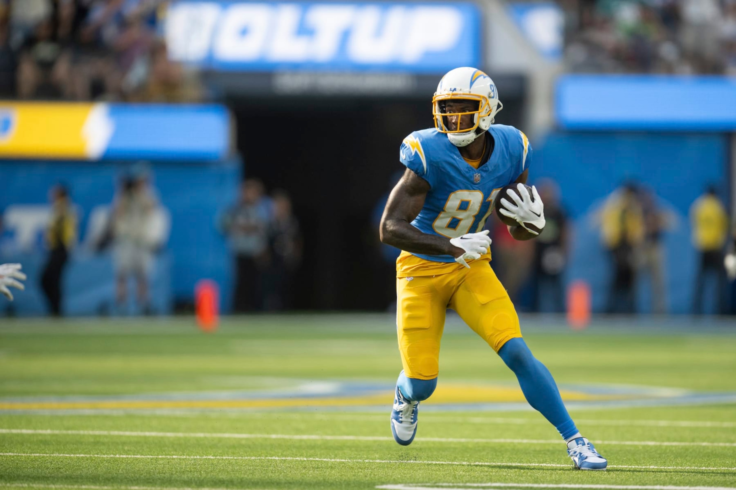 Los Angeles Chargers wide receiver Mike Williams (81) runs with the ball during an NFL football game against the Miami Dolphins, Sunday, Sept. 10, 2023, in Inglewood, Calif. (AP Photo/Kyusung Gong)