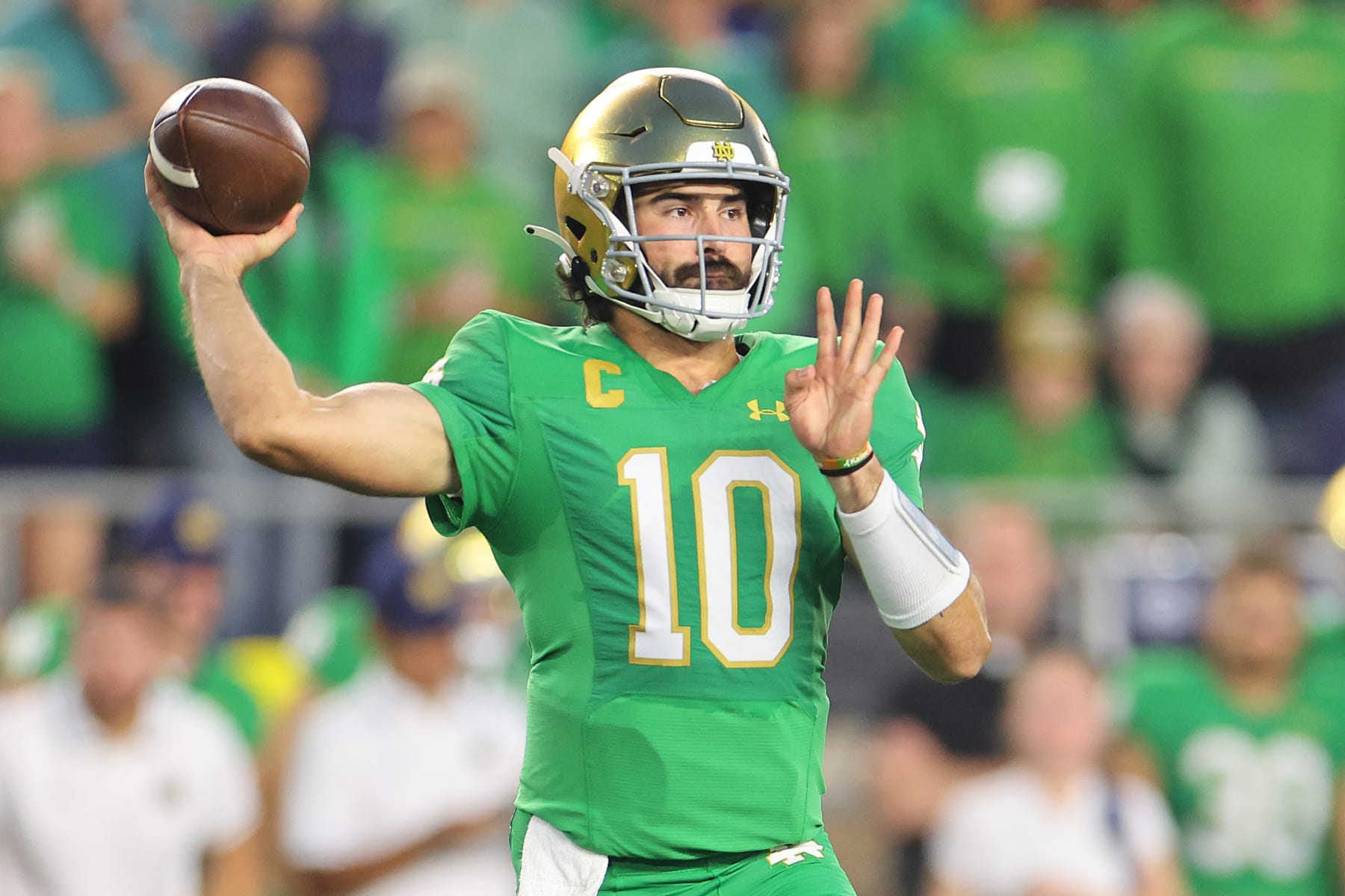 SOUTH BEND, INDIANA - SEPTEMBER 23: Sam Hartman #10 of the Notre Dame Fighting Irish throws a pass against the Ohio State Buckeyes during the first half at Notre Dame Stadium on September 23, 2023 in South Bend, Indiana. (Photo by Michael Reaves/Getty Images)