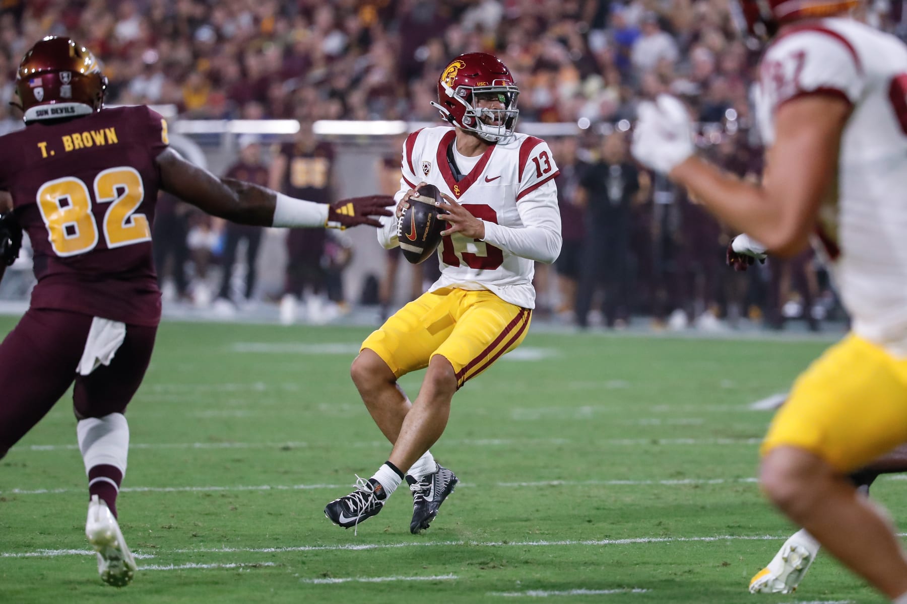 TEMPE, AZ - SEPTEMBER 23:  USC Trojans quarterback Caleb Williams (13) looks to pass during the college football game between the USC Trojans and the Arizona State Sun Devils on September 23, 2023 at Mountain America Stadium in Tempe, Arizona. (Photo by Kevin Abele/Icon Sportswire via Getty Images)