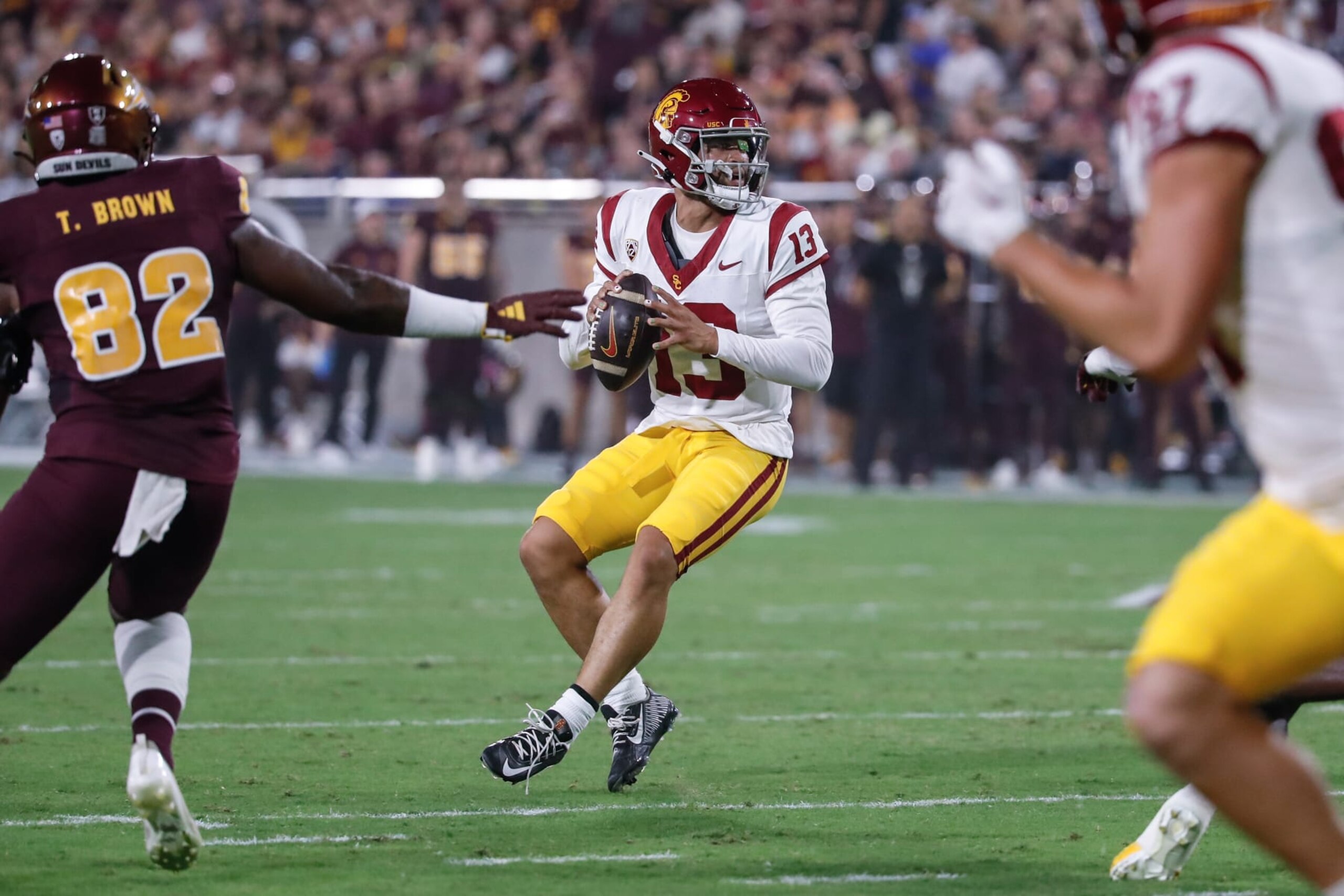 TEMPE, AZ - SEPTEMBER 23:  USC Trojans quarterback Caleb Williams (13) looks to pass during the college football game between the USC Trojans and the Arizona State Sun Devils on September 23, 2023 at Mountain America Stadium in Tempe, Arizona. (Photo by Kevin Abele/Icon Sportswire via Getty Images)