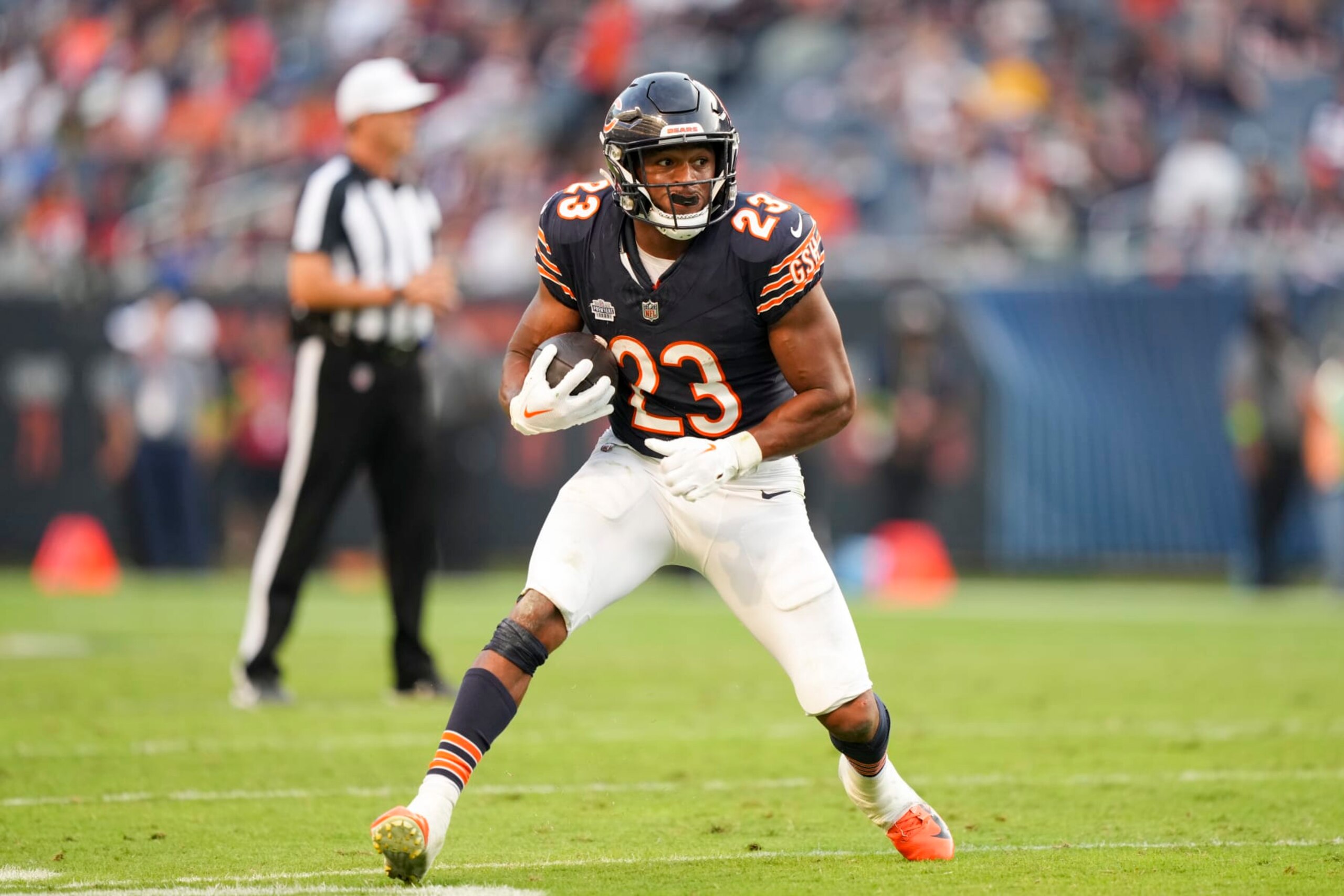 CHICAGO, IL - SEPTEMBER 10: Running back Roschon Johnson #23 of the Chicago Bears runs the ball during an NFL football game against the Green Bay Packers at Soldier Field on September 10, 2023 in Chicago, Illinois. (Photo by Todd Rosenberg/Getty Images)