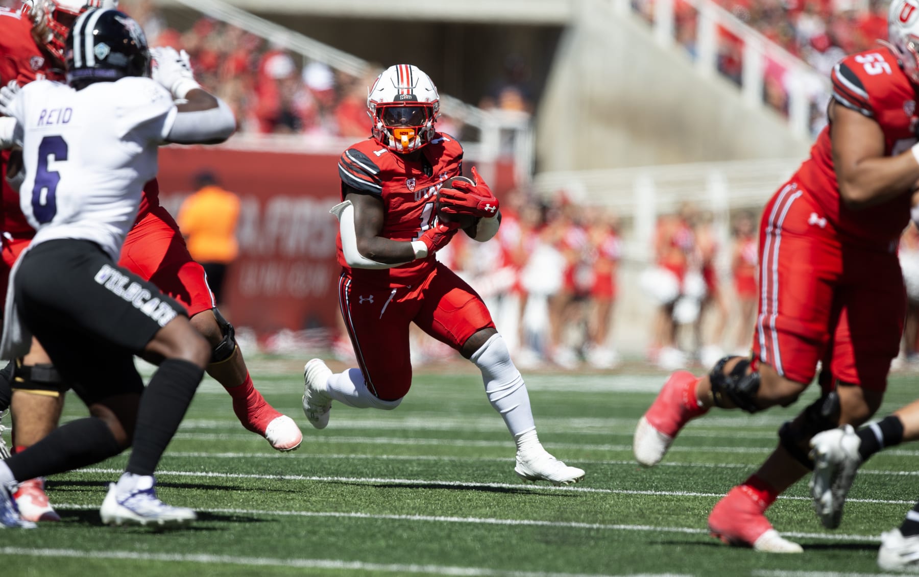 SALT LAKE CITY, UT - SEPTEMBER 16: Jaylon Glover #1 of the Utah Utes rushes the ball against the Weber State Wildcats during the first half of their game at Rice-Eccles Stadium September 16, 2023 in Salt Lake City, Utah. (Photo by Chris Gardner/Getty Images)