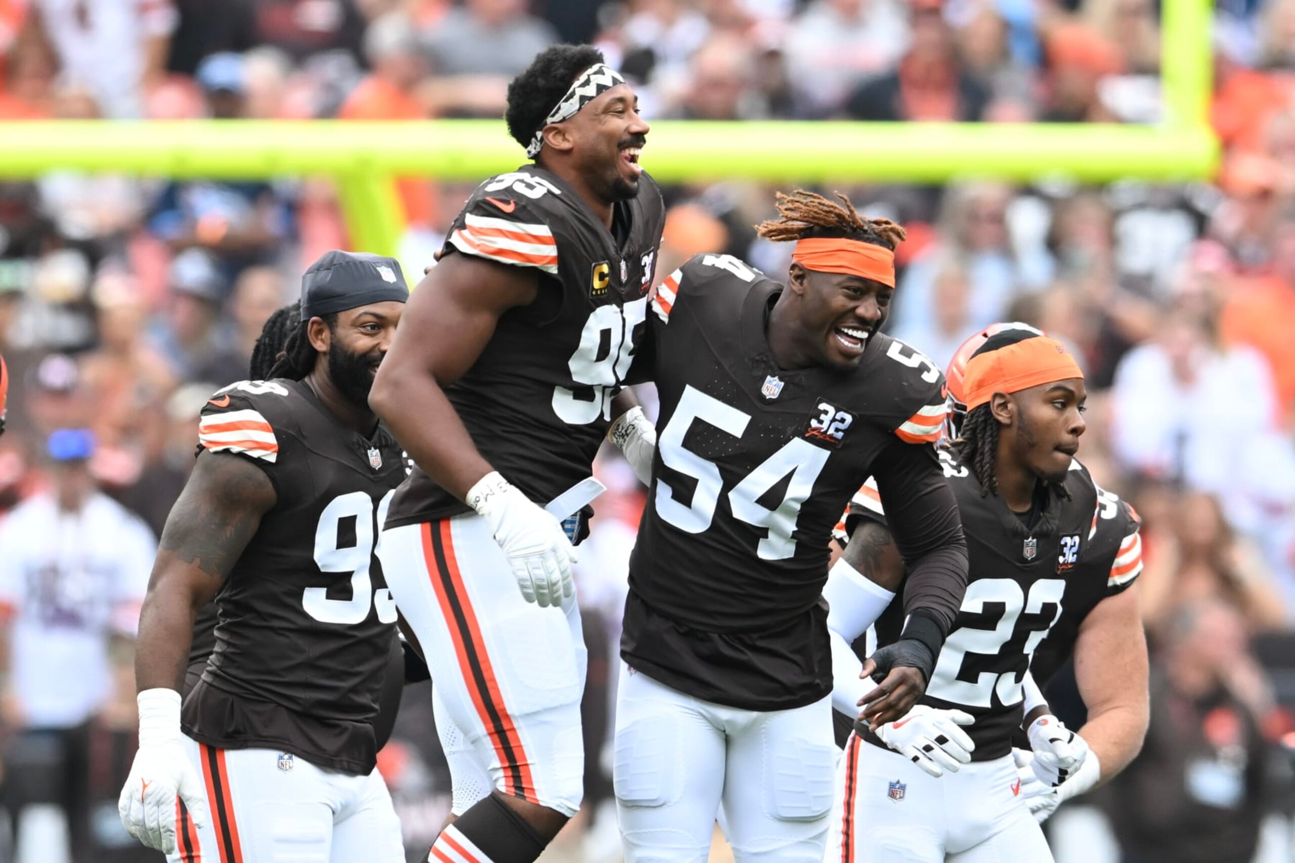 CLEVELAND, OHIO - SEPTEMBER 24: Myles Garrett #95 and Ogbo Okoronkwo #54 of the Cleveland Browns celebrate during player introductions before the game against the Tennessee Titans at Cleveland Browns Stadium on September 24, 2023 in Cleveland, Ohio. (Photo by Nick Cammett/Getty Images) CLEVELAND, OHIO - SEPTEMBER 24: Myles Garrett #95 and Ogbo Okoronkwo #54 of the Cleveland Browns celebrate during player introductions before the game against the Tennessee Titans at Cleveland Browns Stadium on September 24, 2023 in Cleveland, Ohio. (Photo by Nick Cammett/Getty Images)