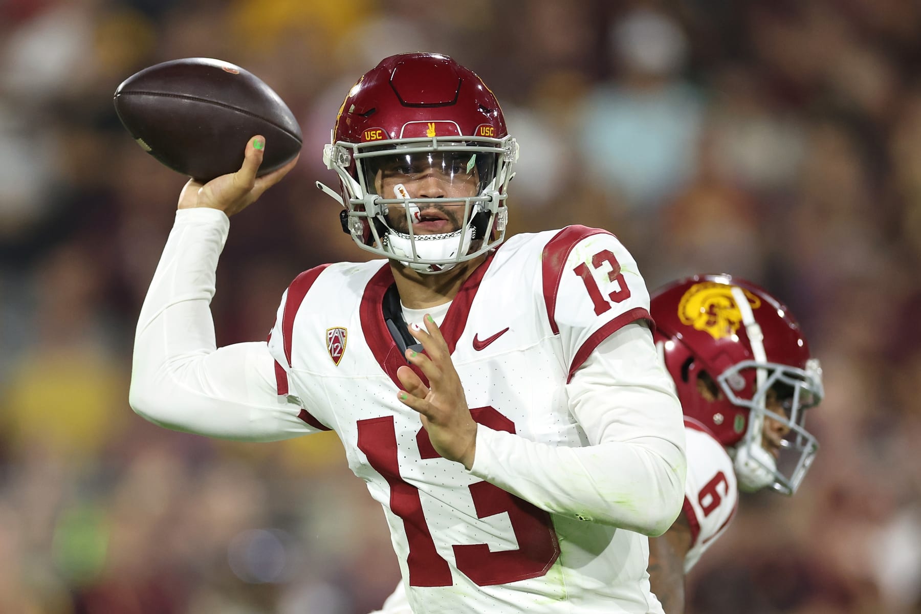 TEMPE, ARIZONA - SEPTEMBER 23: Quarterback Caleb Williams #13 of the USC Trojans throws a pass during the first half of the NCAAF game against the Arizona State Sun Devils at Mountain America Stadium on September 23, 2023 in Tempe, Arizona. (Photo by Christian Petersen/Getty Images) TEMPE, ARIZONA - SEPTEMBER 23: Quarterback Caleb Williams #13 of the USC Trojans throws a pass during the first half of the NCAAF game against the Arizona State Sun Devils at Mountain America Stadium on September 23, 2023 in Tempe, Arizona. (Photo by Christian Petersen/Getty Images)
