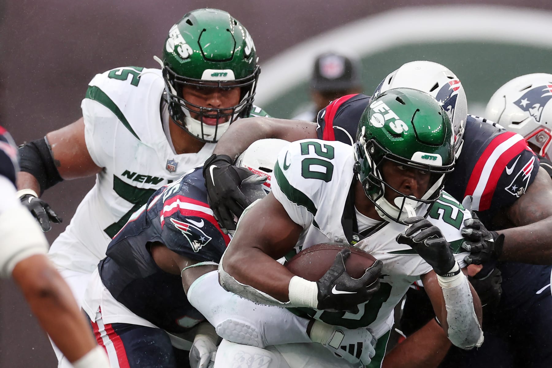 EAST RUTHERFORD, NEW JERSEY - SEPTEMBER 24: Breece Hall #20 of the New York Jets runs with the ball in the first half of a game against the New England Patriots at MetLife Stadium on September 24, 2023 in East Rutherford, New Jersey. (Photo by Al Bello/Getty Images)