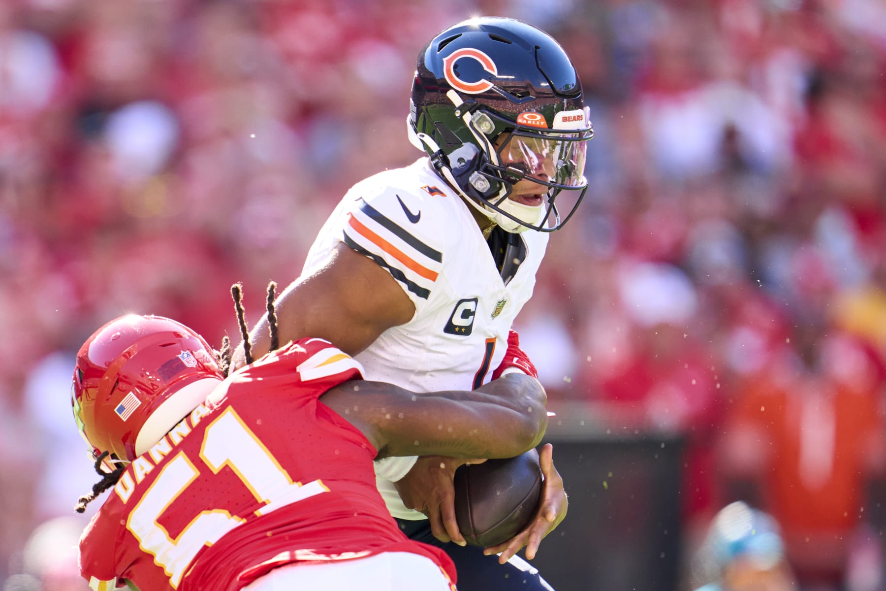 KANSAS CITY, MO - SEPTEMBER 24: Justin Fields #1 of the Chicago Bears scrambles against the Kansas City Chiefs during the first half at GEHA Field at Arrowhead Stadium on September 24, 2023 in Kansas City, Missouri. (Photo by Cooper Neill/Getty Images)