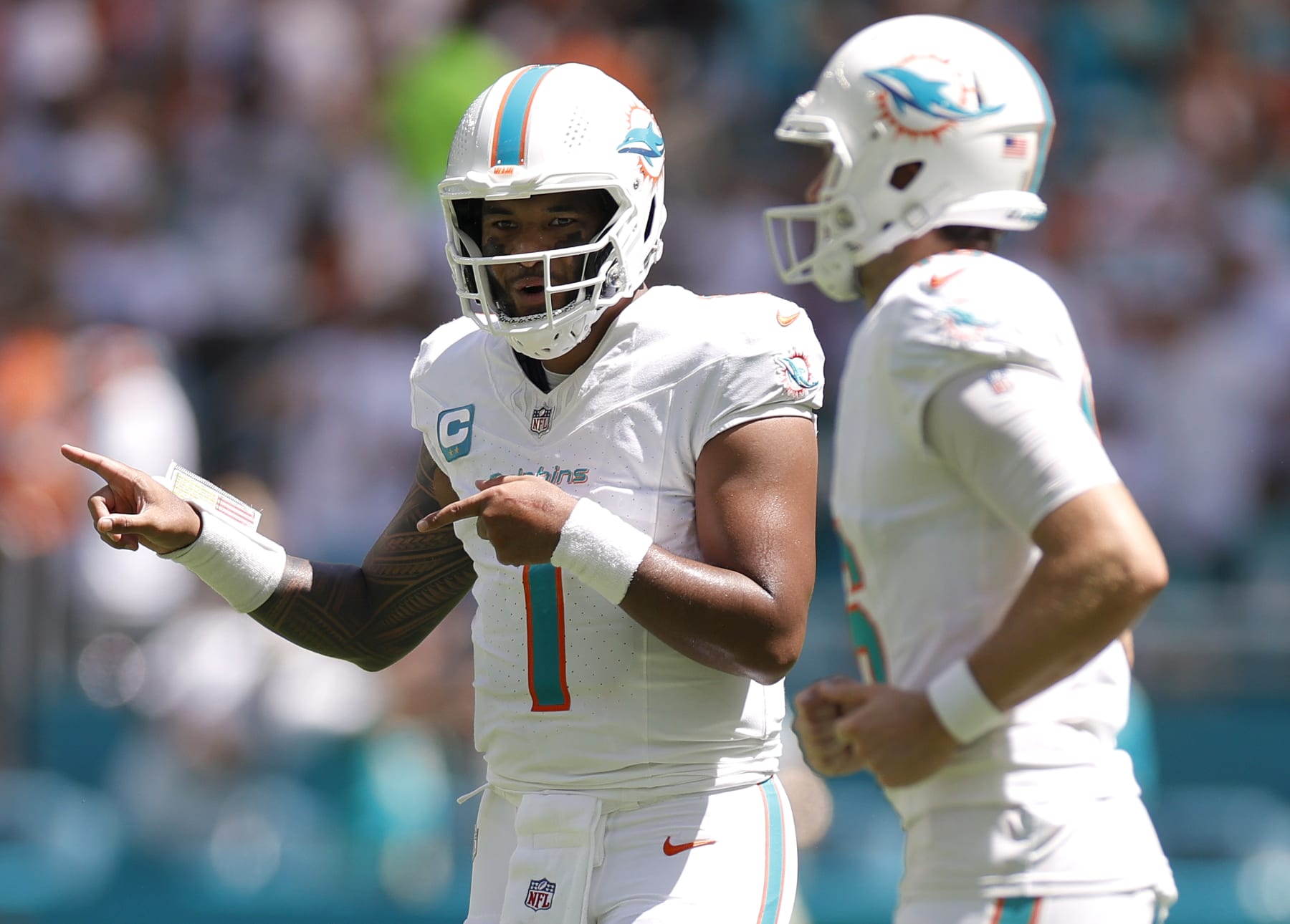 MIAMI GARDENS, FLORIDA - SEPTEMBER 24: Tua Tagovailoa #1 of the Miami Dolphins celebrates after his touchdown pass during the second quarter against the Denver Broncos at Hard Rock Stadium on September 24, 2023 in Miami Gardens, Florida. (Photo by Carmen Mandato/Getty Images)