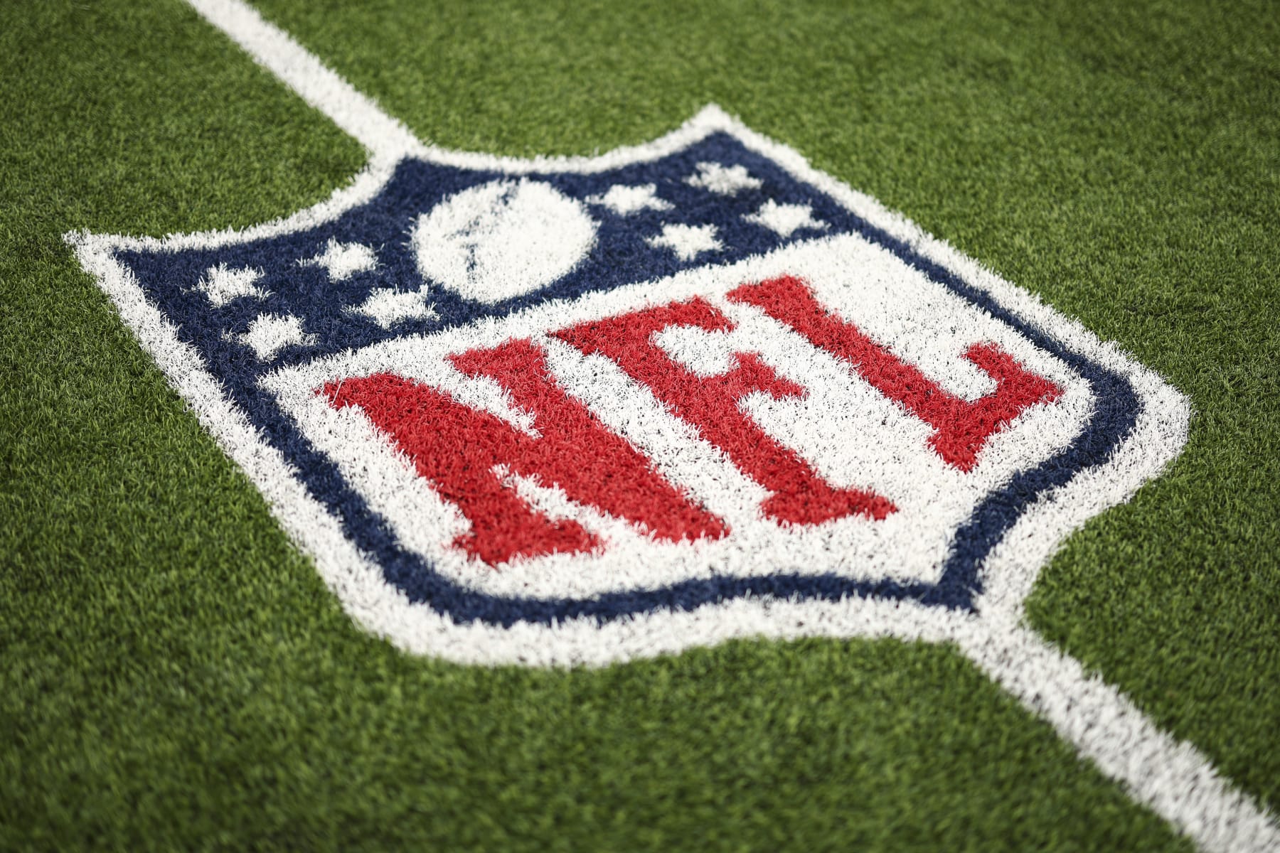 ORCHARD PARK, NY - SEPTEMBER 17: An NFL Shield logo is painted on the field prior to an NFL football game between the Buffalo Bills and the Las Vegas Raiders at Highmark Stadium on September 17, 2023 in Orchard Park, New York. (Photo by Kevin Sabitus/Getty Images)