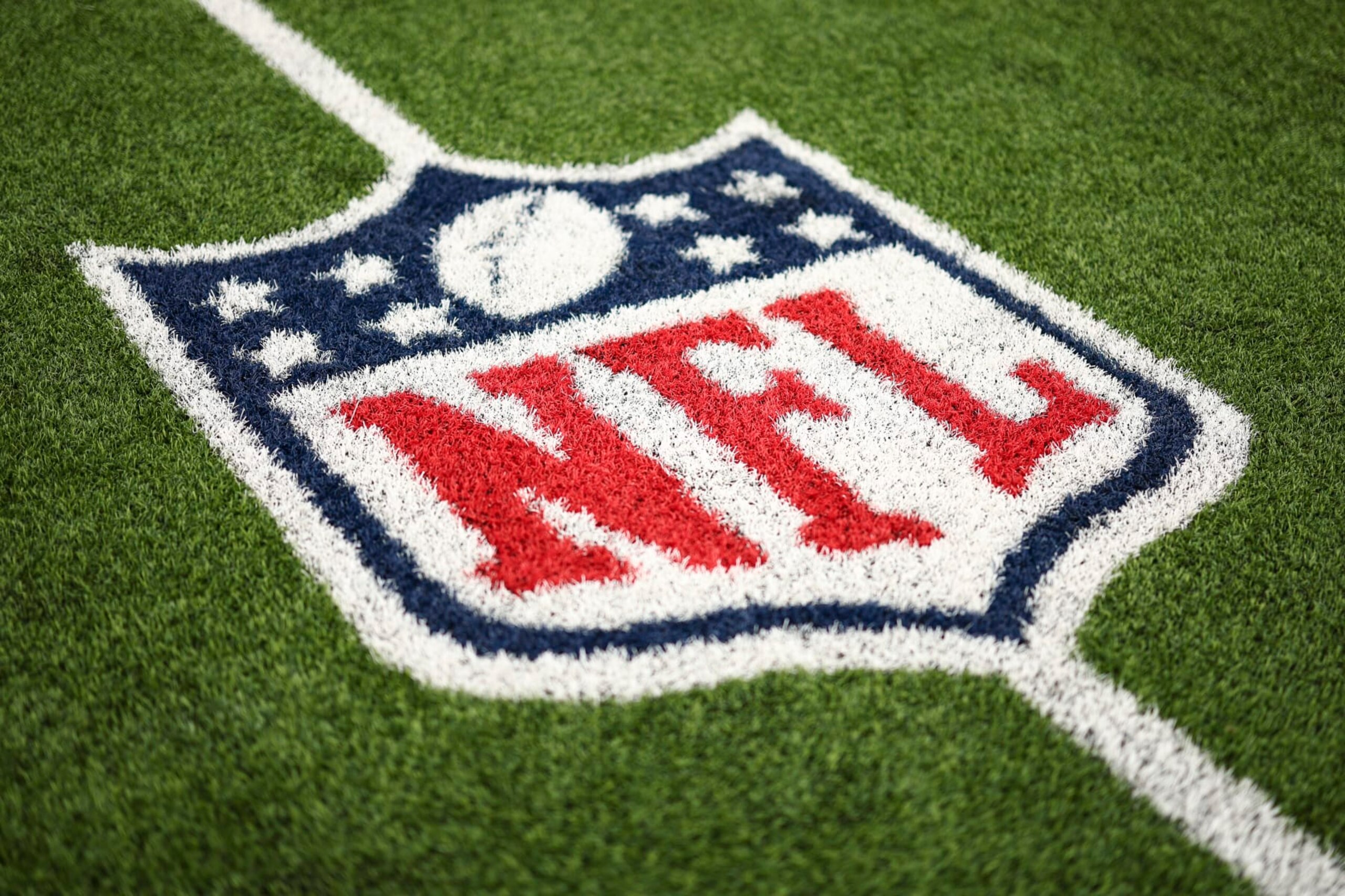 ORCHARD PARK, NY - SEPTEMBER 17: An NFL Shield logo is painted on the field prior to an NFL football game between the Buffalo Bills and the Las Vegas Raiders at Highmark Stadium on September 17, 2023 in Orchard Park, New York. (Photo by Kevin Sabitus/Getty Images)