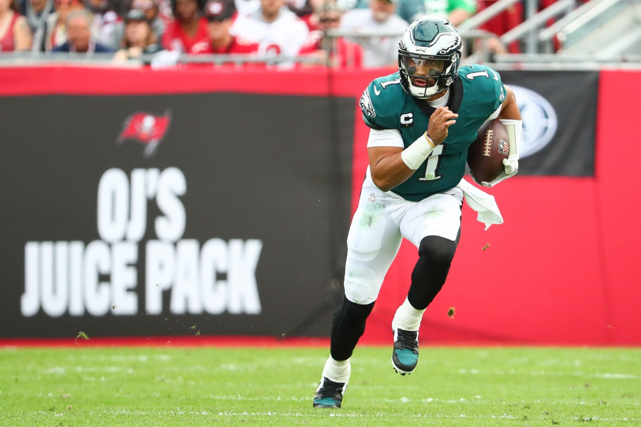 TAMPA, FL - JANUARY 16: Jalen Hurts #1 of the Philadelphia Eagles scrambles during the NFC Wild Card Playoff game against the Tampa Bay Buccaneers at Raymond James Stadium on January 16, 2022 in Tampa, Florida. (Photo by Kevin Sabitus/Getty Images)