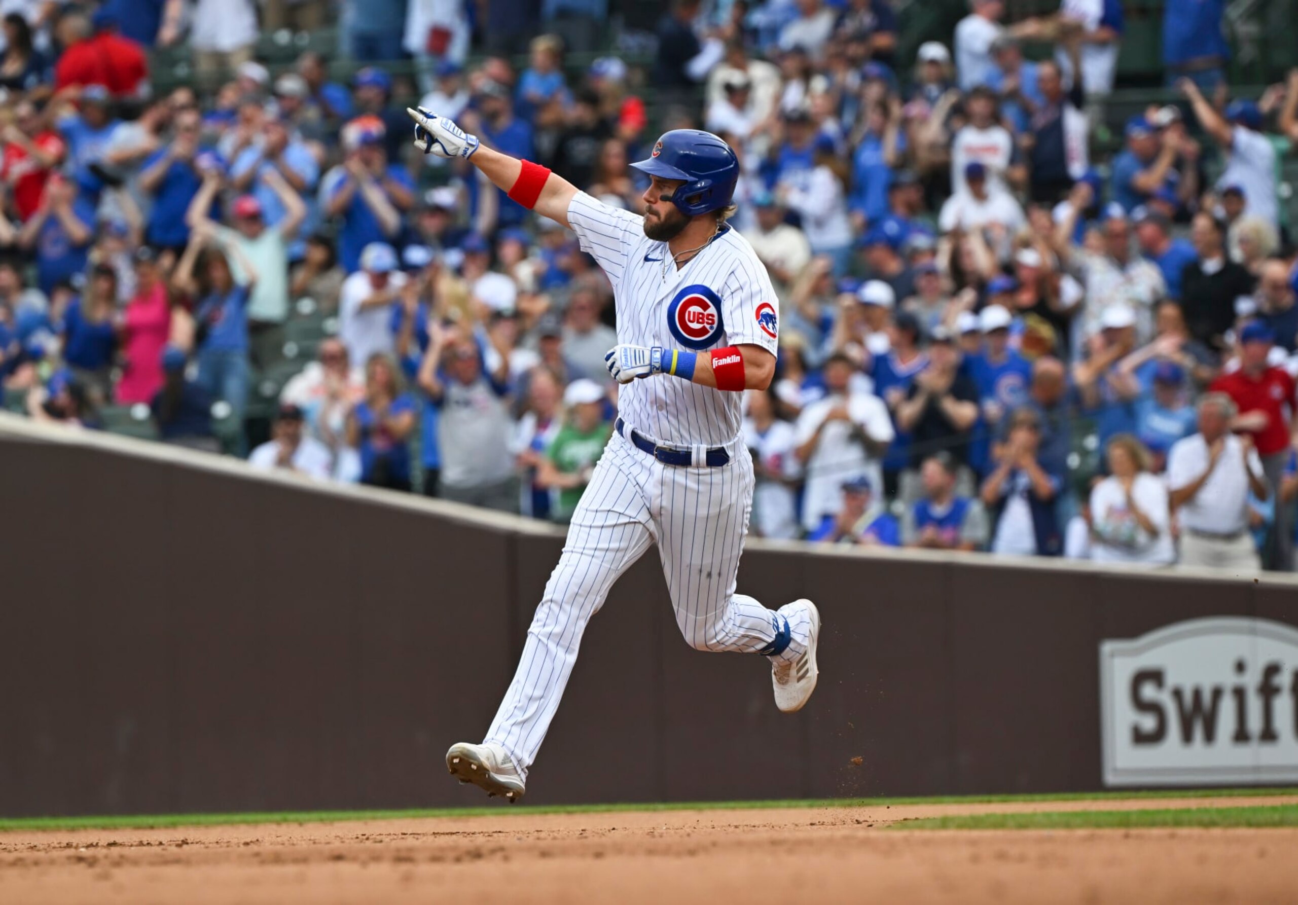 CHICAGO, ILLINOIS - SEPTEMBER 24: Patrick Wisdom #16 of the Chicago Cubs celebrates a two-run home run during the sixth inning against the Colorado Rockies at Wrigley Field on September 24, 2023 in Chicago, Illinois. The Cubs defeated the Rockies 4-3. (Photo by Nuccio DiNuzzo/Getty Images) CHICAGO, ILLINOIS - SEPTEMBER 24: Patrick Wisdom #16 of the Chicago Cubs celebrates a two-run home run during the sixth inning against the Colorado Rockies at Wrigley Field on September 24, 2023 in Chicago, Illinois. The Cubs defeated the Rockies 4-3. (Photo by Nuccio DiNuzzo/Getty Images)