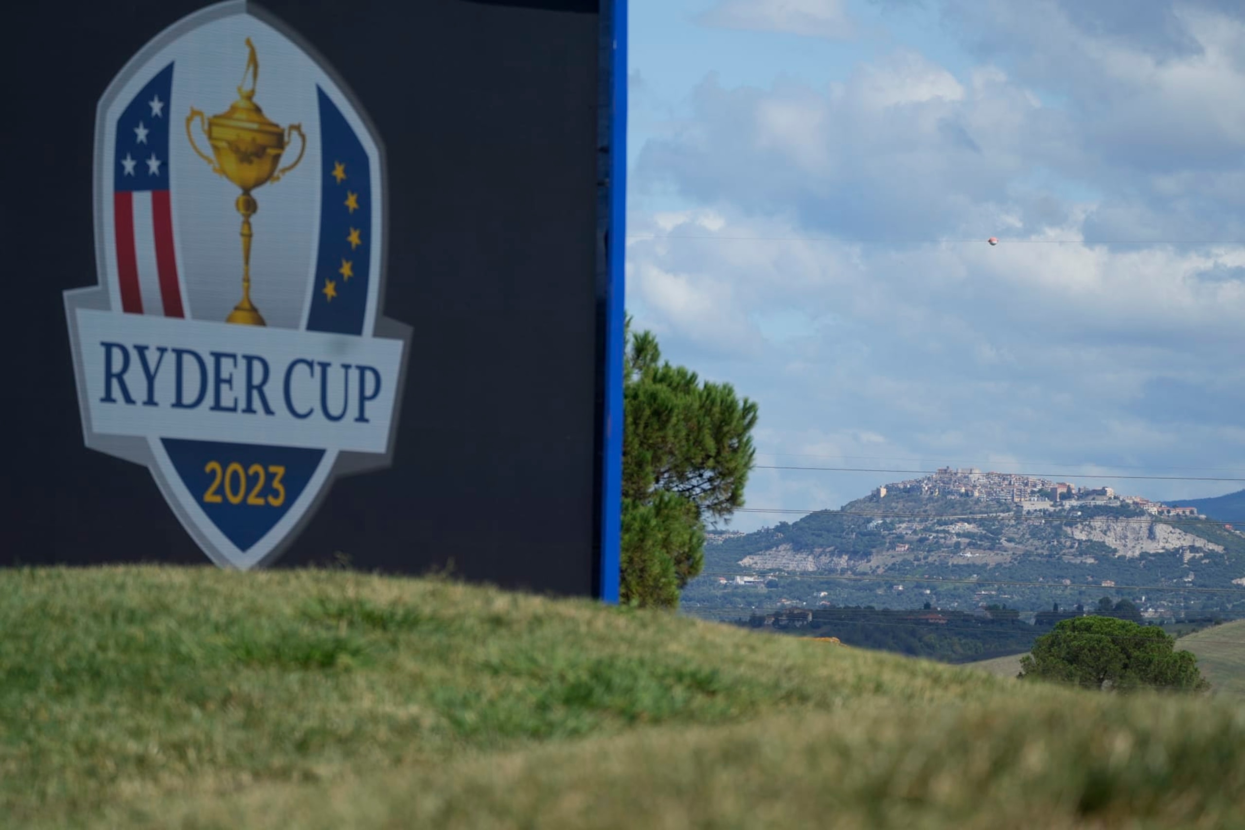 Sant'Angelo Romano village is seen in the background on the golf course at the Marco Simone Golf Club in Guidonia Montecelio, Monday, Sept. 25, 2023. The Marco Simone Club on the outskirts of Rome will host the 44th edition of The Ryder Cup, the biennial competition between Europe and the United States headed to Italy for the first time. (AP Photo/Gregorio Borgia)