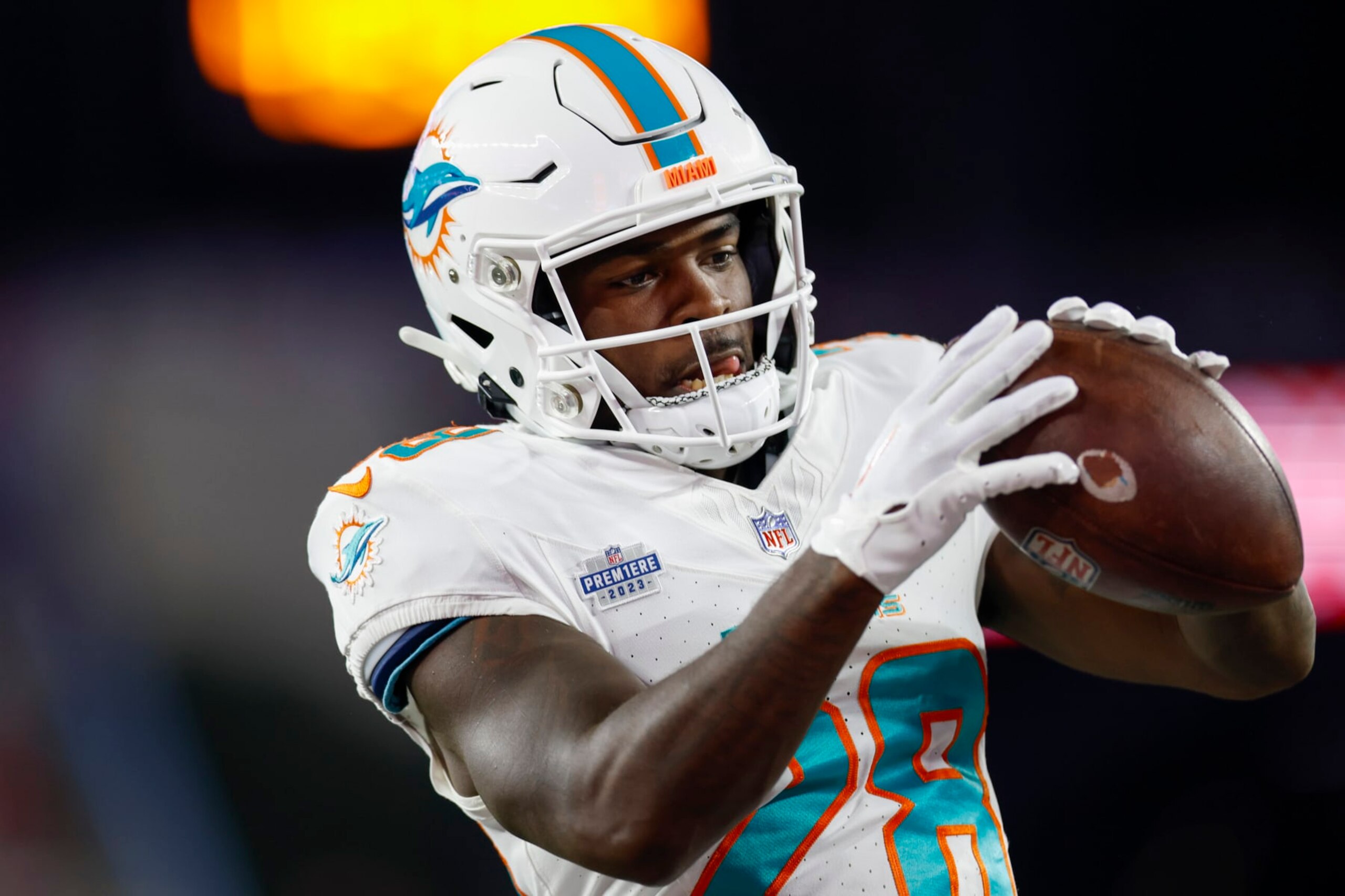 Miami Dolphins running back De'Von Achane (28) makes a catch before an NFL football game against the New England Patriots on Sunday, Sept. 17, 2023, in Foxborough, Mass. (AP Photo/Greg M. Cooper)