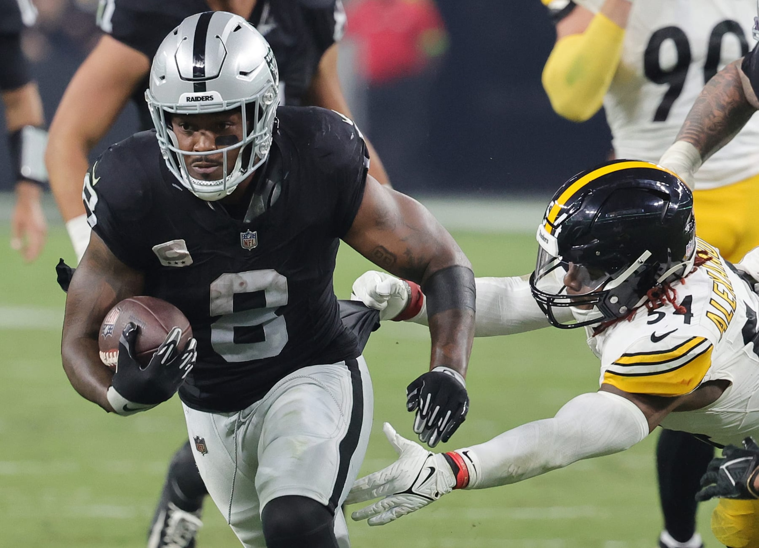 LAS VEGAS, NEVADA - SEPTEMBER 24: Josh Jacobs #8 of the Las Vegas Raiders is chased by Kwon Alexander #54 of the Pittsburgh Steelers during the fourth quarter at Allegiant Stadium on September 24, 2023 in Las Vegas, Nevada. (Photo by Ethan Miller/Getty Images)