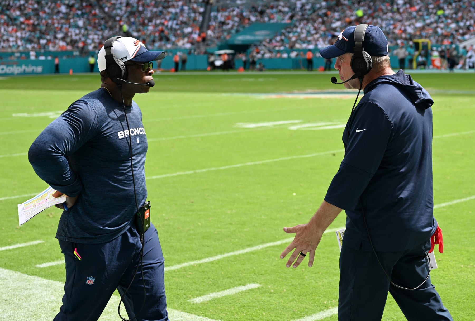 Vance Joseph and Sean Payton