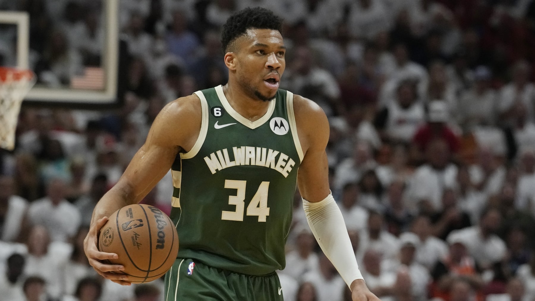 Milwaukee Bucks forward Giannis Antetokounmpo (34) dribbles during the first half of Game 4 in a first-round NBA basketball playoff series against the Miami Heat, Monday, April 24, 2023, in Miami. (AP Photo/Marta Lavandier)