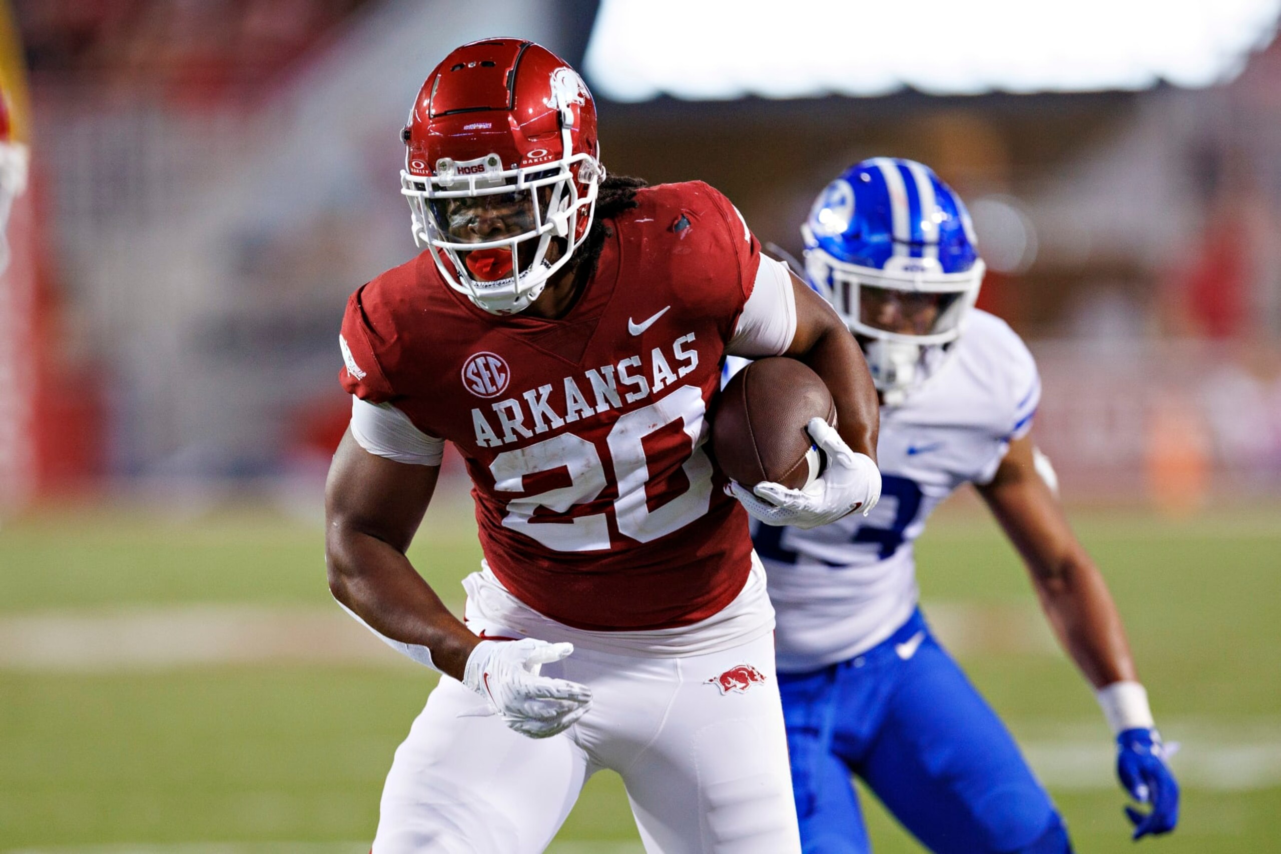 FAYETTEVILLE, ARKANSAS - SEPTEMBER 16:  Dominique Johnson #20 of the Arkansas Razorbacks runs the ball in the first half during the game against the BYU Cougars at Donald W. Reynolds Razorback Stadium on September 16, 2023 in Fayetteville, Arkansas. (Photo by Wesley Hitt/Getty Images)