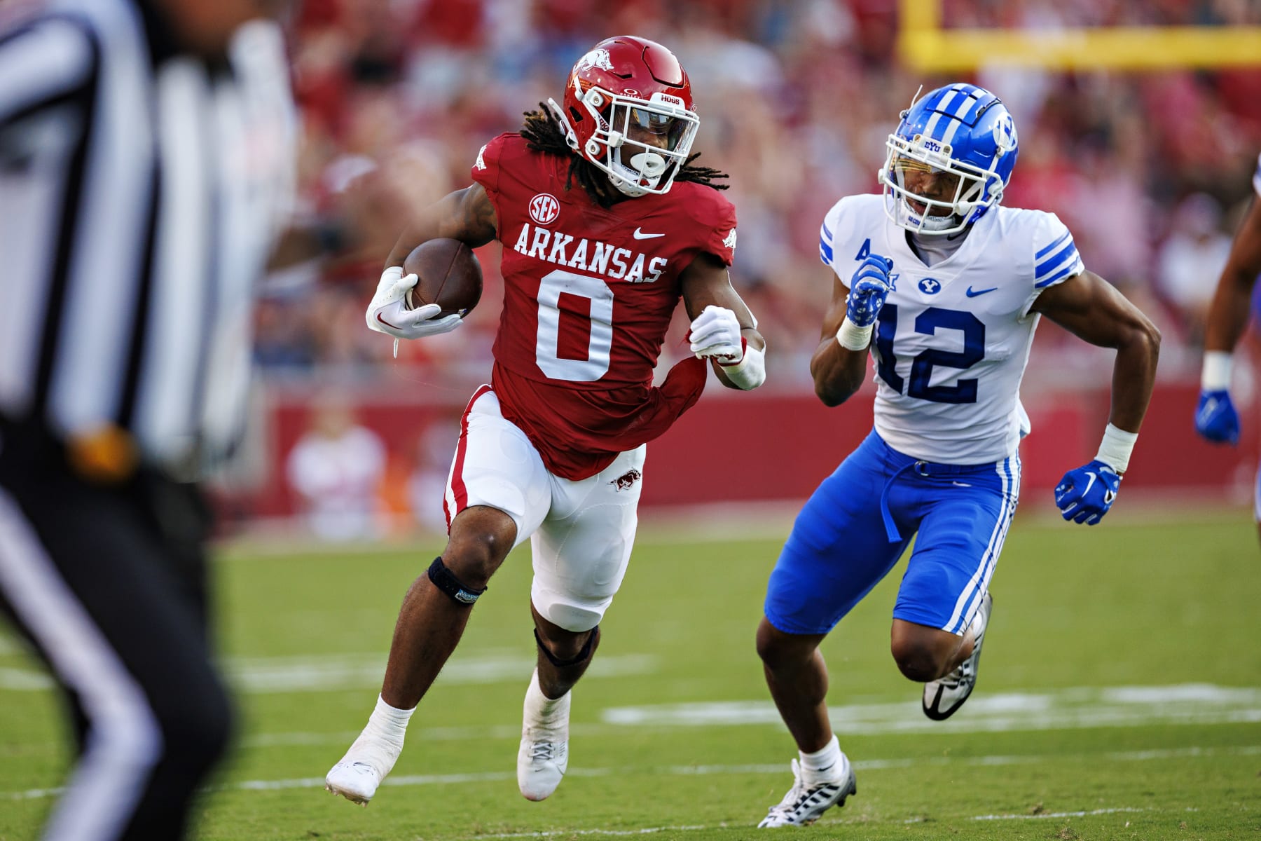FAYETTEVILLE, ARKANSAS - SEPTEMBER 16: A.J. Green #0 of the Arkansas Razorbacks runs the ball for a touchdown in the first half during the game against the BYU Cougars at Donald W. Reynolds Razorback Stadium on September 16, 2023 in Fayetteville, Arkansas. (Photo by Wesley Hitt/Getty Images)