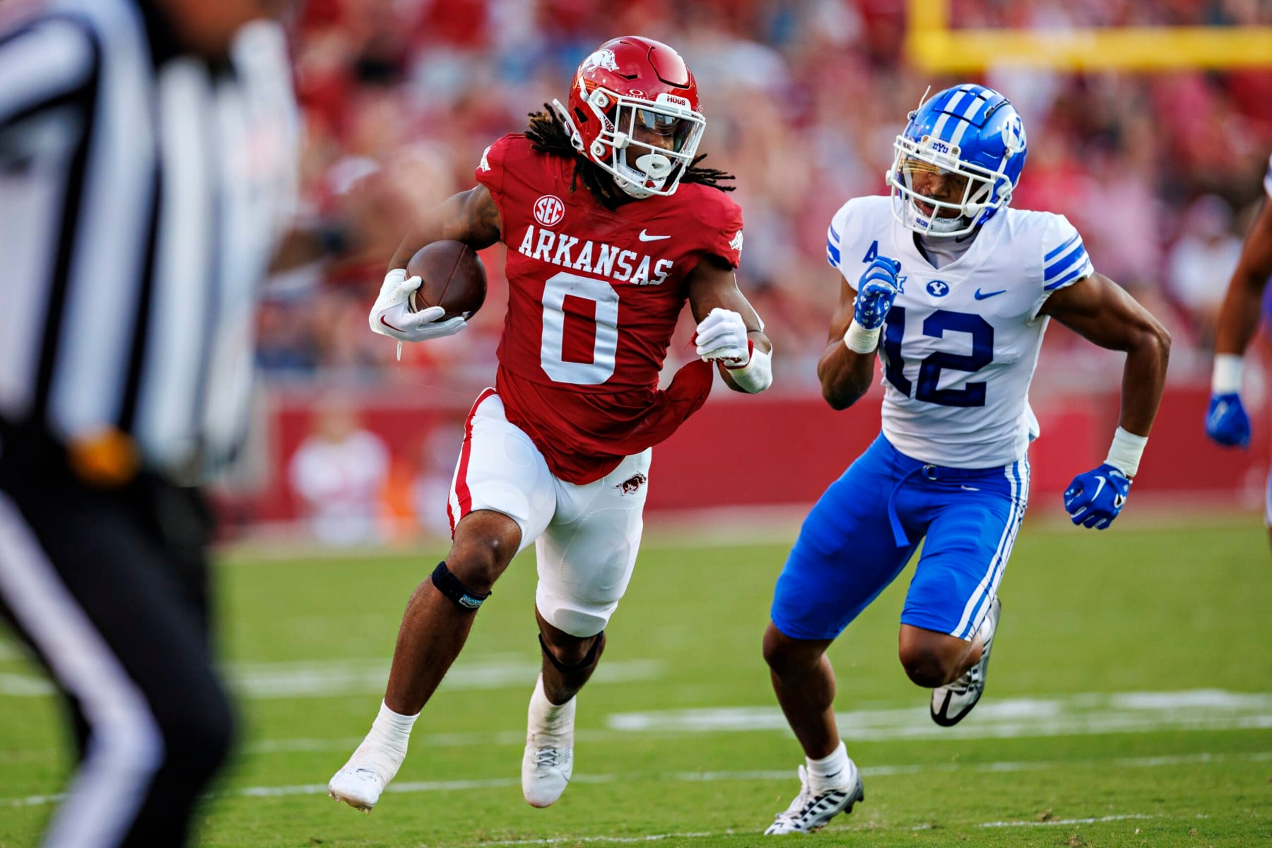 FAYETTEVILLE, ARKANSAS - SEPTEMBER 16: A.J. Green #0 of the Arkansas Razorbacks runs the ball for a touchdown in the first half during the game against the BYU Cougars at Donald W. Reynolds Razorback Stadium on September 16, 2023 in Fayetteville, Arkansas. (Photo by Wesley Hitt/Getty Images)