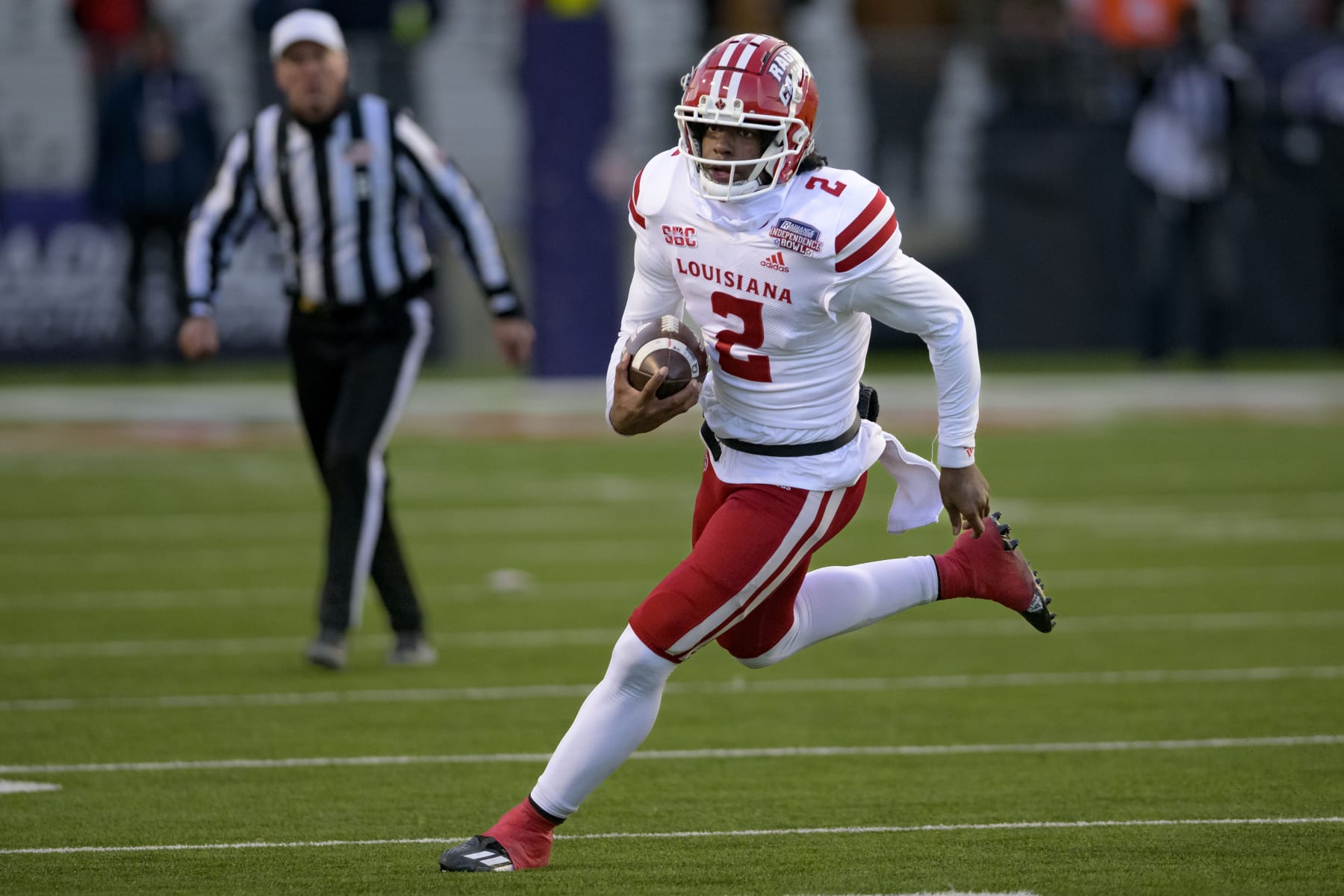Louisiana-Lafayette quarterback Zeon Chriss (2) runs during the Independence Bowl NCAA football game in Shreveport, La. Friday, Dec. 23, 2022. (AP Photo/Matthew Hinton)