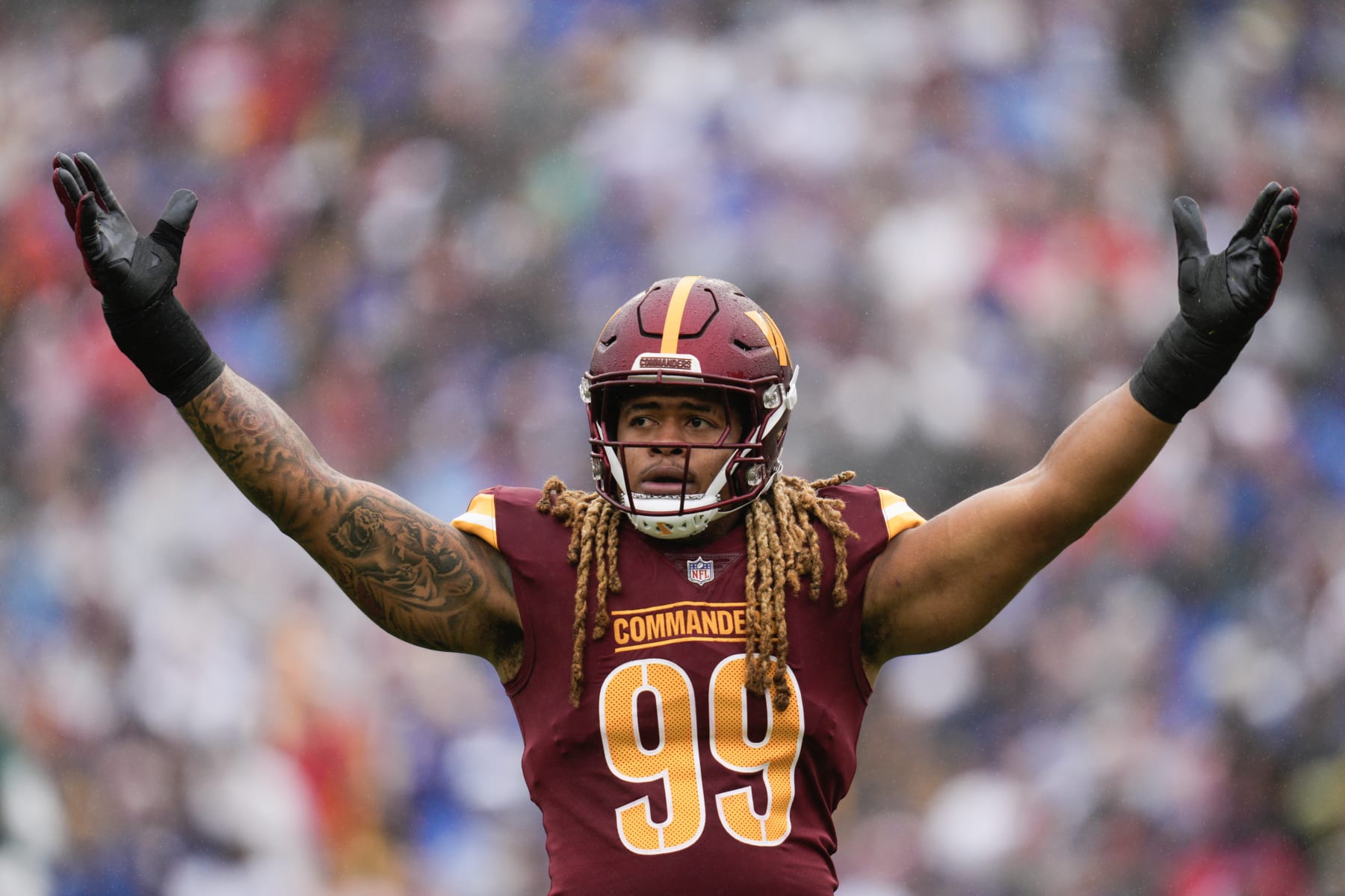 LANDOVER, MARYLAND - SEPTEMBER 24: Chase Young #99 of the Washington Commanders reacts during the first quarter of a game against the Buffalo Bills at FedExField on September 24, 2023 in Landover, Maryland. (Photo by Jess Rapfogel/Getty Images)