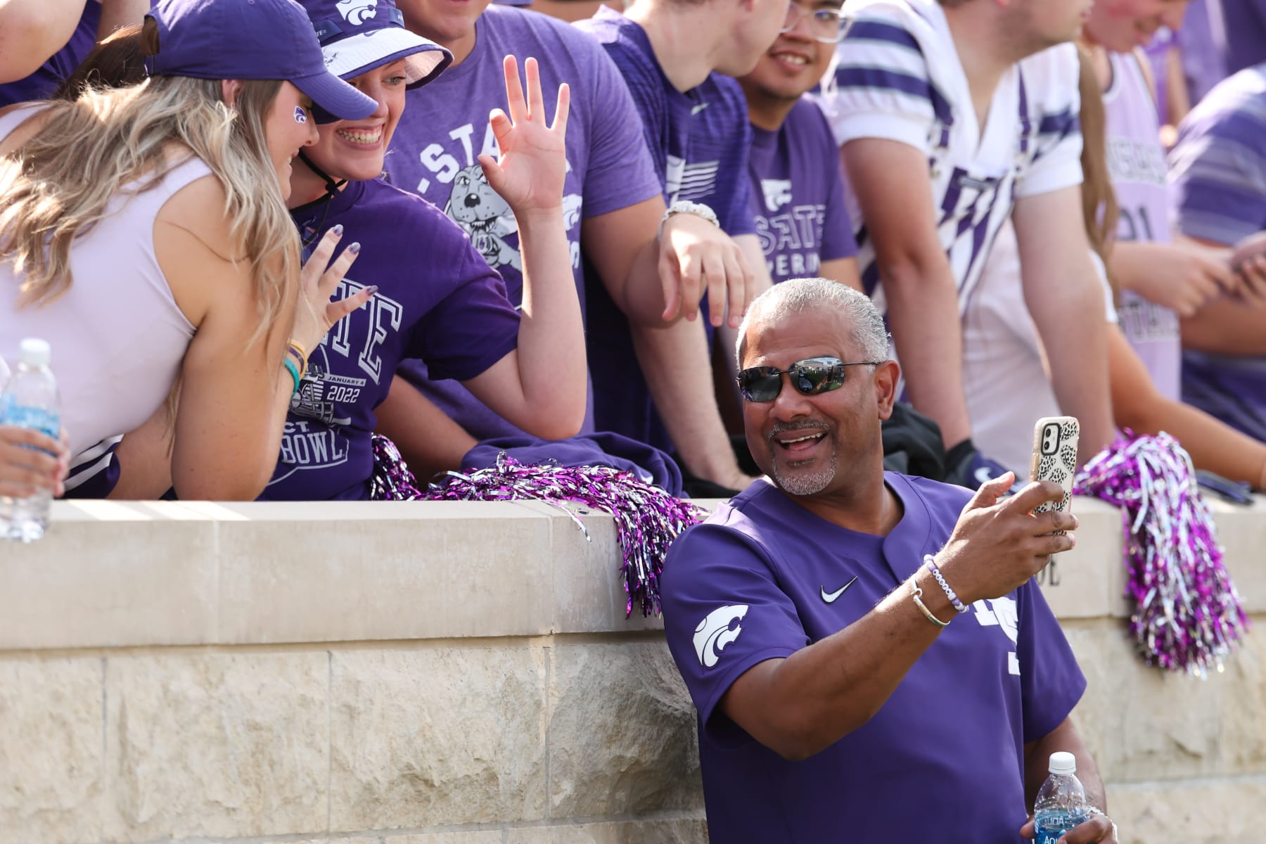 MANHATTAN, KS - SEPTEMBER 09: Kansas State Wildcats basketball coach Jerome Tang takes selfies with fans before a college football game between the Troy Trojans and Kansas State Wildcats on Sep 9, 2023 at Bill Snyder Family Stadium in Manhattan, KS. (Photo by Scott Winters/Icon Sportswire via Getty Images)