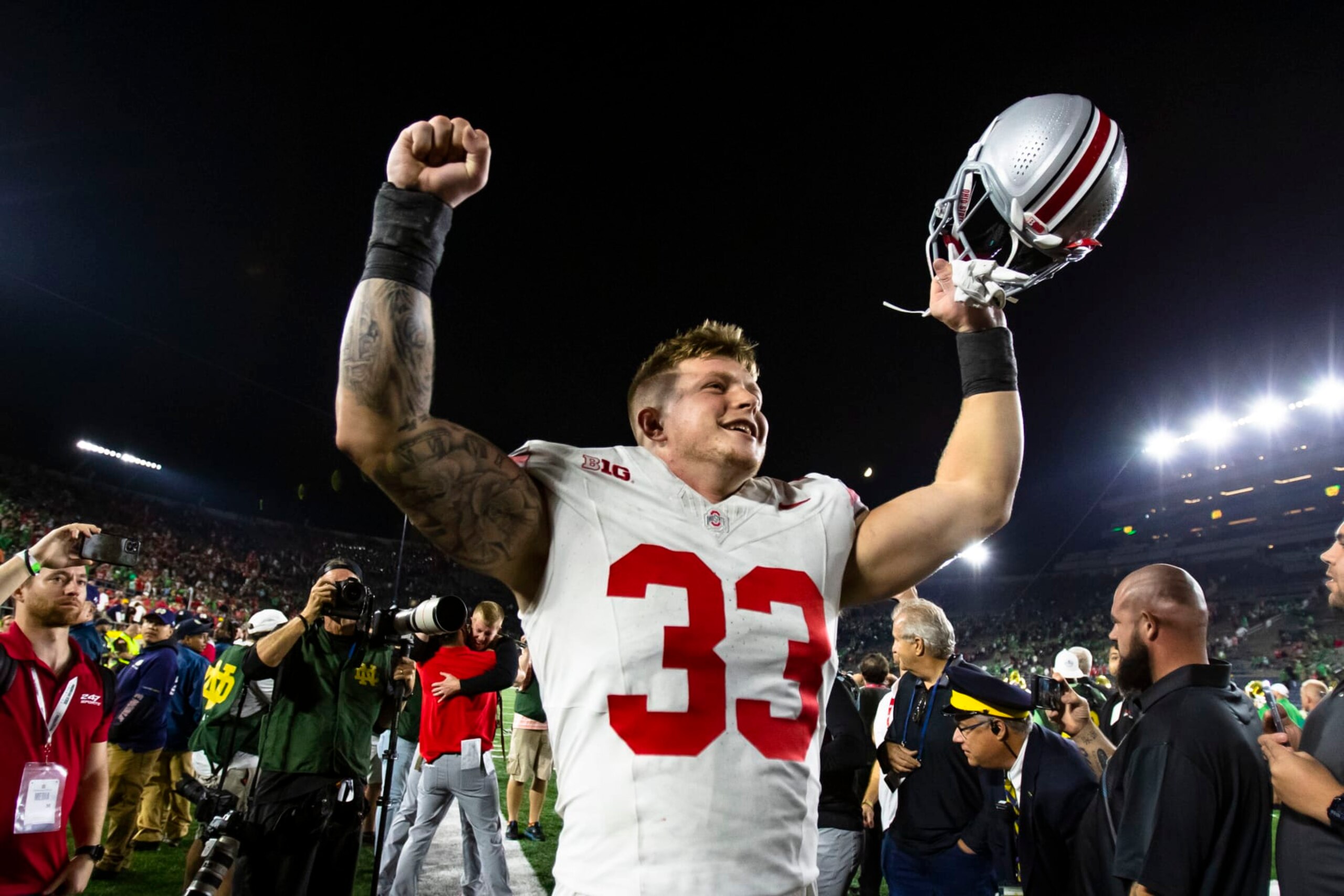 Ohio State's Jack Sawyer (33) celebrates a win after an NCAA college football game against Notre Dame on Saturday, Sept. 23, 2023, in South Bend, Ind. (AP Photo/Michael Caterina)