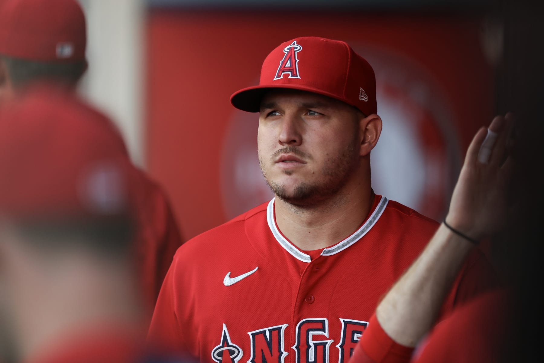 ANAHEIM, CALIFORNIA - AUGUST 22: Mike Trout #27 of the Los Angeles Angels looks on from the dugout ahead of the game against the Cincinnati Reds at Angel Stadium of Anaheim on August 22, 2023 in Anaheim, California. (Photo by Meg Oliphant/Getty Images)