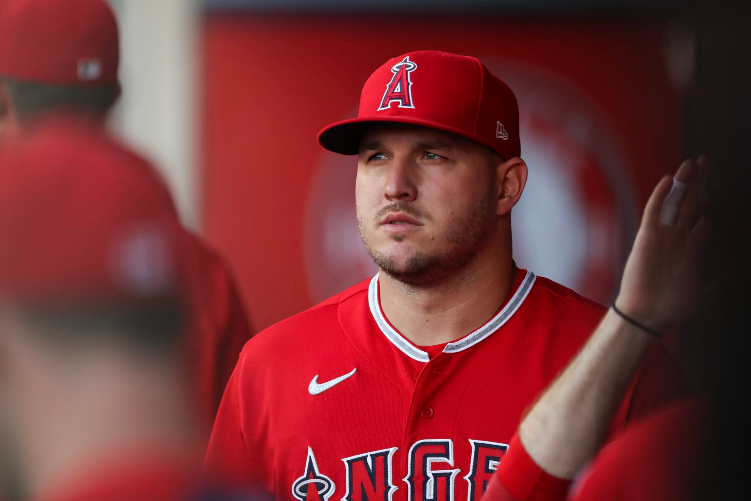 ANAHEIM, CALIFORNIA - AUGUST 22: Mike Trout #27 of the Los Angeles Angels looks on from the dugout ahead of the game against the Cincinnati Reds at Angel Stadium of Anaheim on August 22, 2023 in Anaheim, California. (Photo by Meg Oliphant/Getty Images)