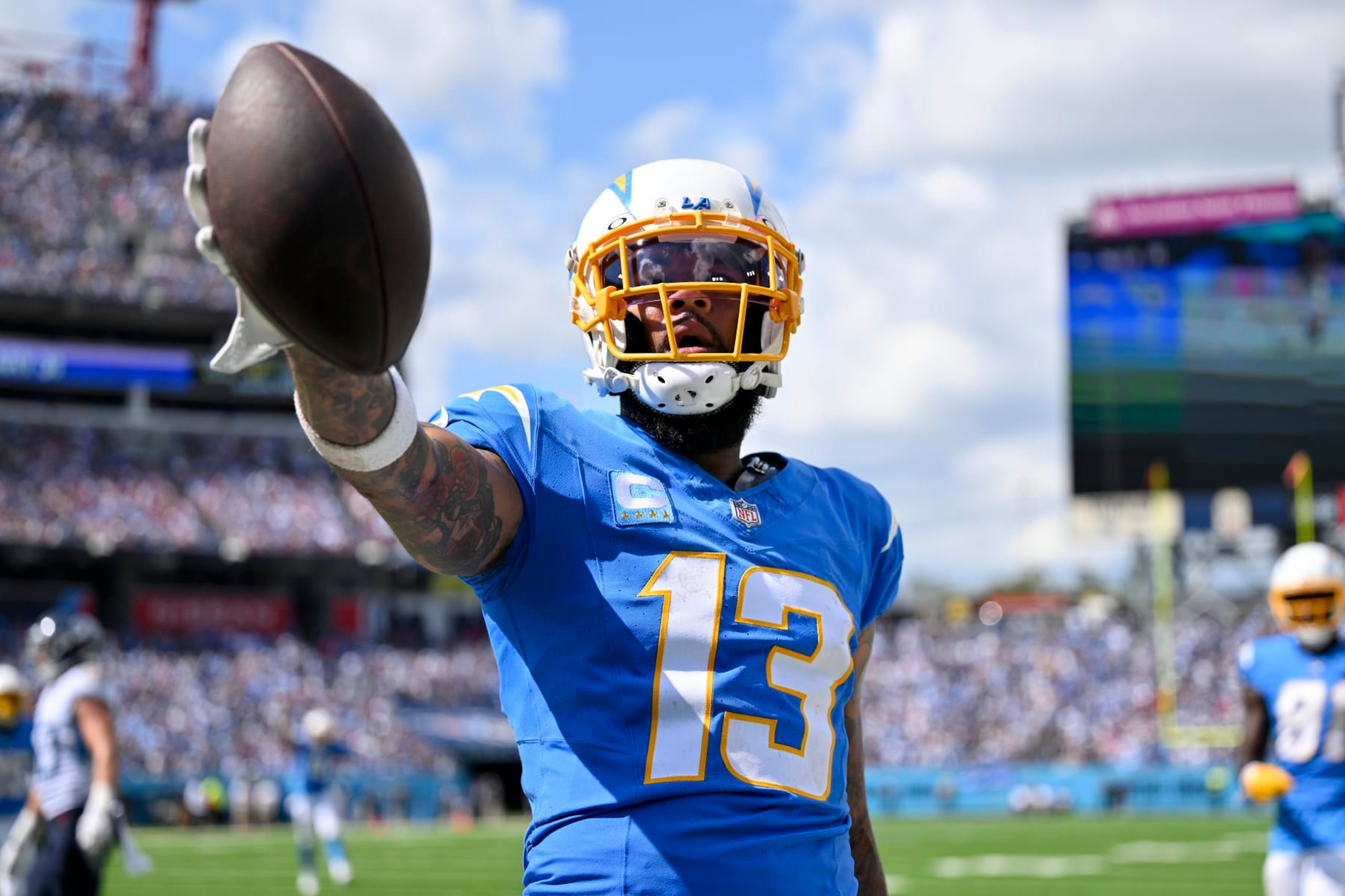 NASHVILLE, TENNESSEE - SEPTEMBER 17: Keenan Allen #13 of the Los Angeles Chargers celebrates after scoring a touchdown during an NFL football game against the Tennessee Titans at Nissan Stadium on September 17, 2023 in Nashville, Tennessee. The Tennessee Titans won 27-24 in overtime. (Photo by Alika Jenner/Getty Images)