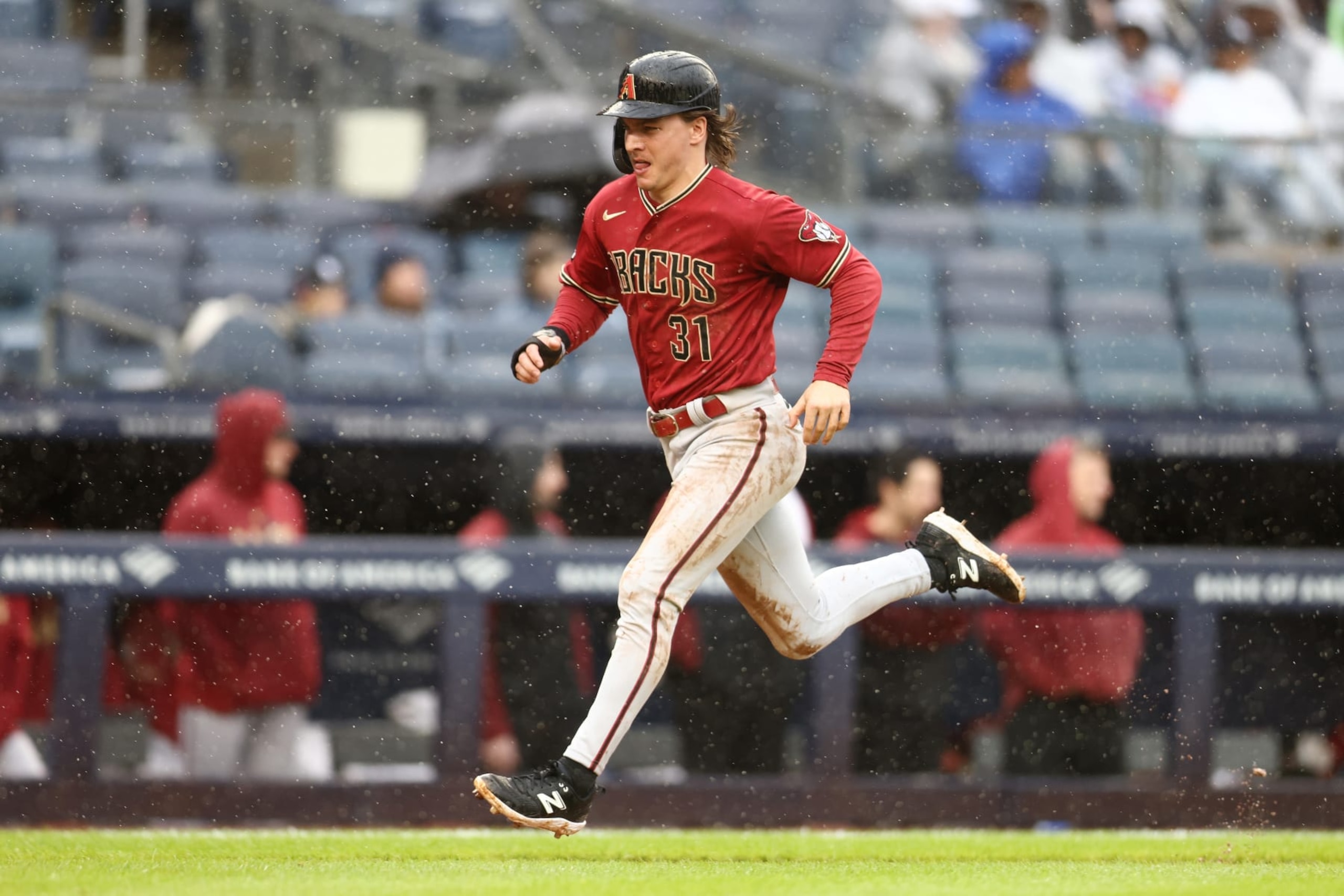 NEW YORK, NEW YORK - SEPTEMBER 24: Jake McCarthy #31 of the Arizona Diamondbacks scores on Geraldo Perdomo #2 sacrifice fly in the seventh inning of the game against the New York Yankees at Yankee Stadium on September 24, 2023 in the Bronx borough of New York City. (Photo by Mike Stobe/Getty Images) NEW YORK, NEW YORK - SEPTEMBER 24: Jake McCarthy #31 of the Arizona Diamondbacks scores on Geraldo Perdomo #2 sacrifice fly in the seventh inning of the game against the New York Yankees at Yankee Stadium on September 24, 2023 in the Bronx borough of New York City. (Photo by Mike Stobe/Getty Images)