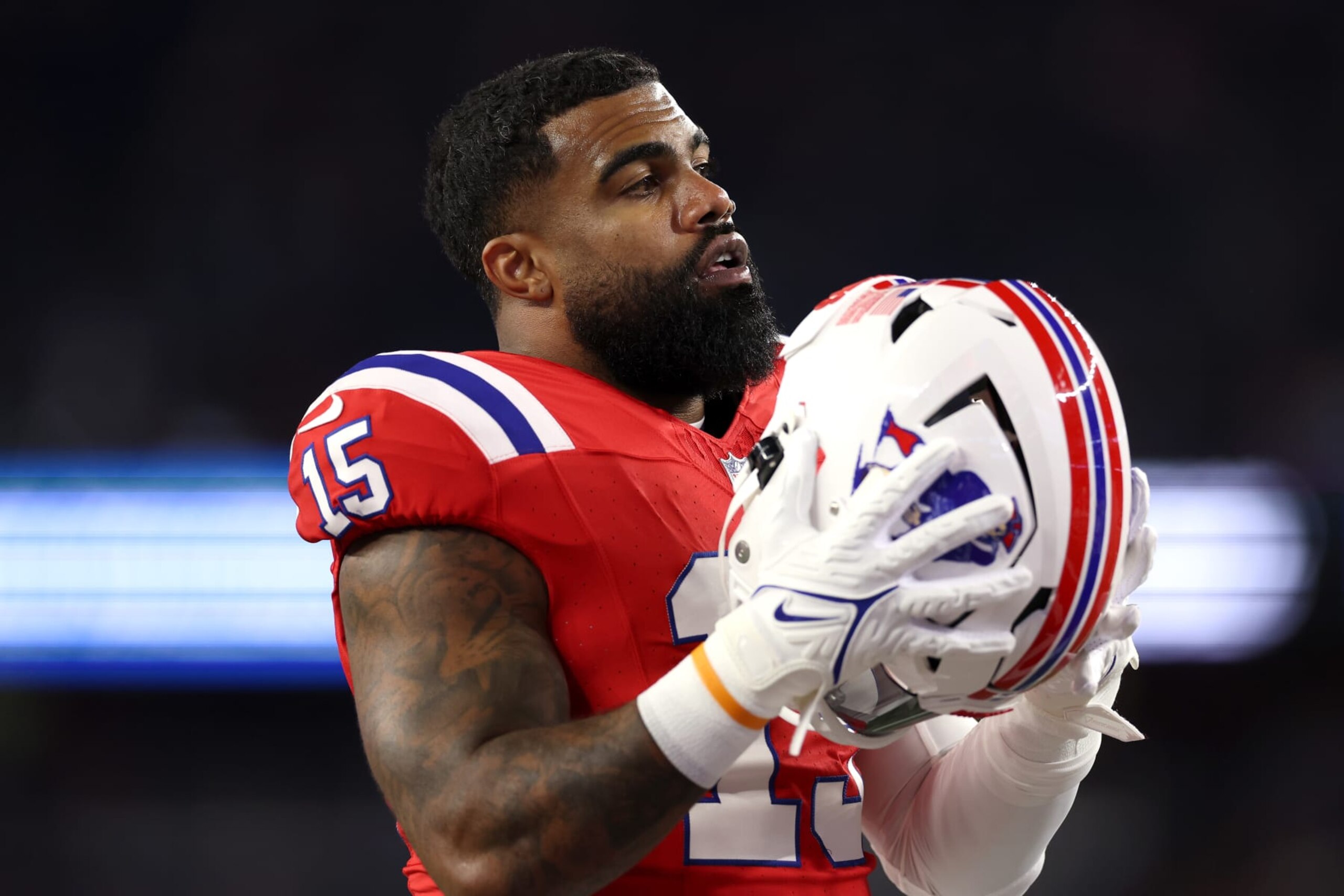 FOXBOROUGH, MASSACHUSETTS - SEPTEMBER 17: Ezekiel Elliott #15 of the New England Patriots looks on prior to a game against the Miami Dolphins at Gillette Stadium on September 17, 2023 in Foxborough, Massachusetts. (Photo by Maddie Meyer/Getty Images) FOXBOROUGH, MASSACHUSETTS - SEPTEMBER 17: Ezekiel Elliott #15 of the New England Patriots looks on prior to a game against the Miami Dolphins at Gillette Stadium on September 17, 2023 in Foxborough, Massachusetts. (Photo by Maddie Meyer/Getty Images)