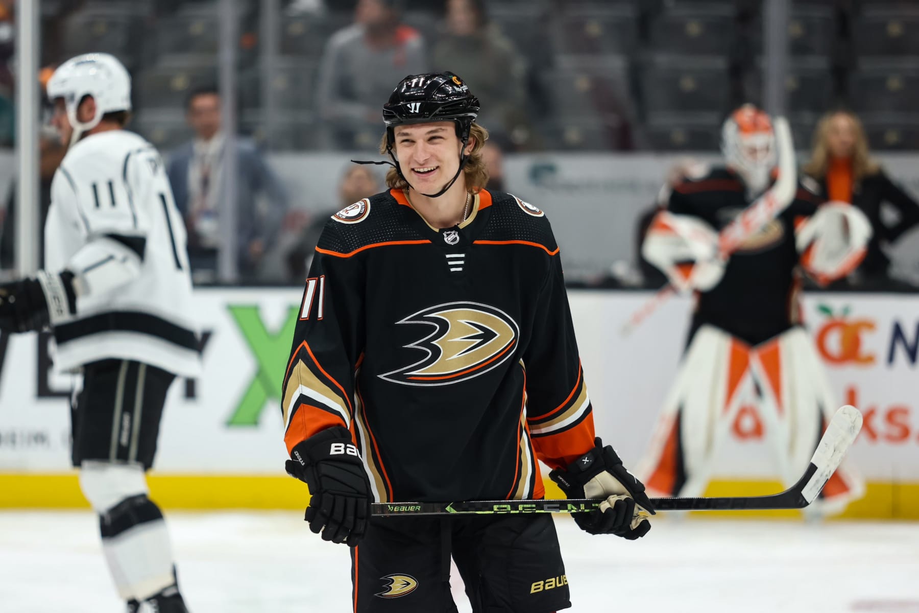 ANAHEIM, CALIFORNIA - APRIL 13: Trevor Zegras #11 of the Anaheim Ducks smiles during warmups before the game against the Los Angeles Kings at Honda Center on April 13, 2023 in Anaheim, California. (Photo by Nicole Vasquez/NHLI via Getty Images)