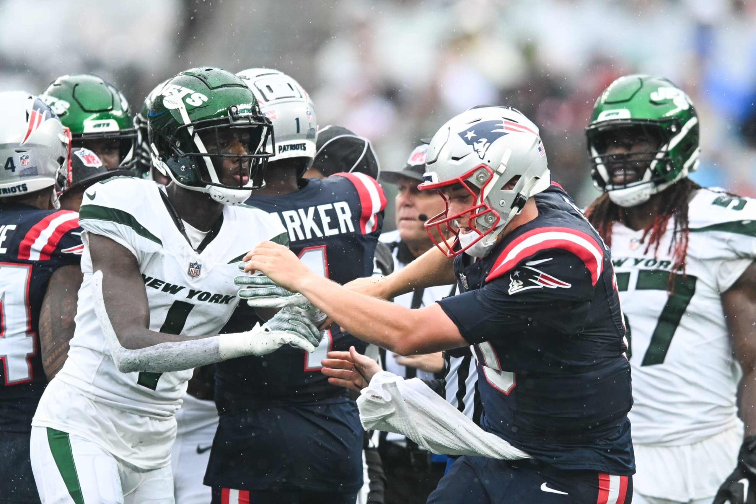 EAST RUTHERFORD, NJ - SEPTEMBER 24: Sauce Gardner #1 of the New York Jets pushes Mac Jones #10 of the New England Patriots during the second half at MetLife Stadium on September 24, 2023 in East Rutherford, New Jersey. (Photo by Kathryn Riley/Getty Images)